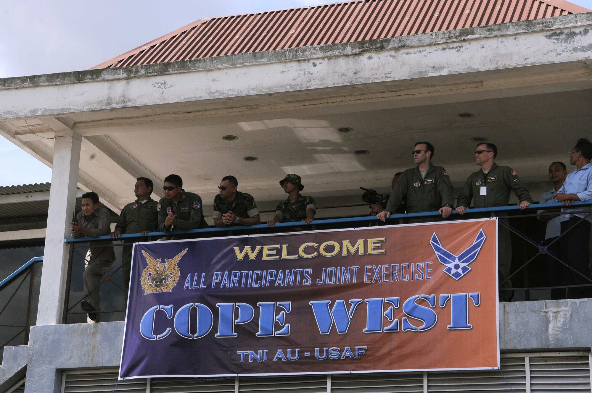 Two officers discuss various scenarios that U.S. and Indonesian airmen will participate in during Exercise Cope West 2010 April 17, 2010, at Halim Air Base, Indonesia. (U.S. Air Force photo)