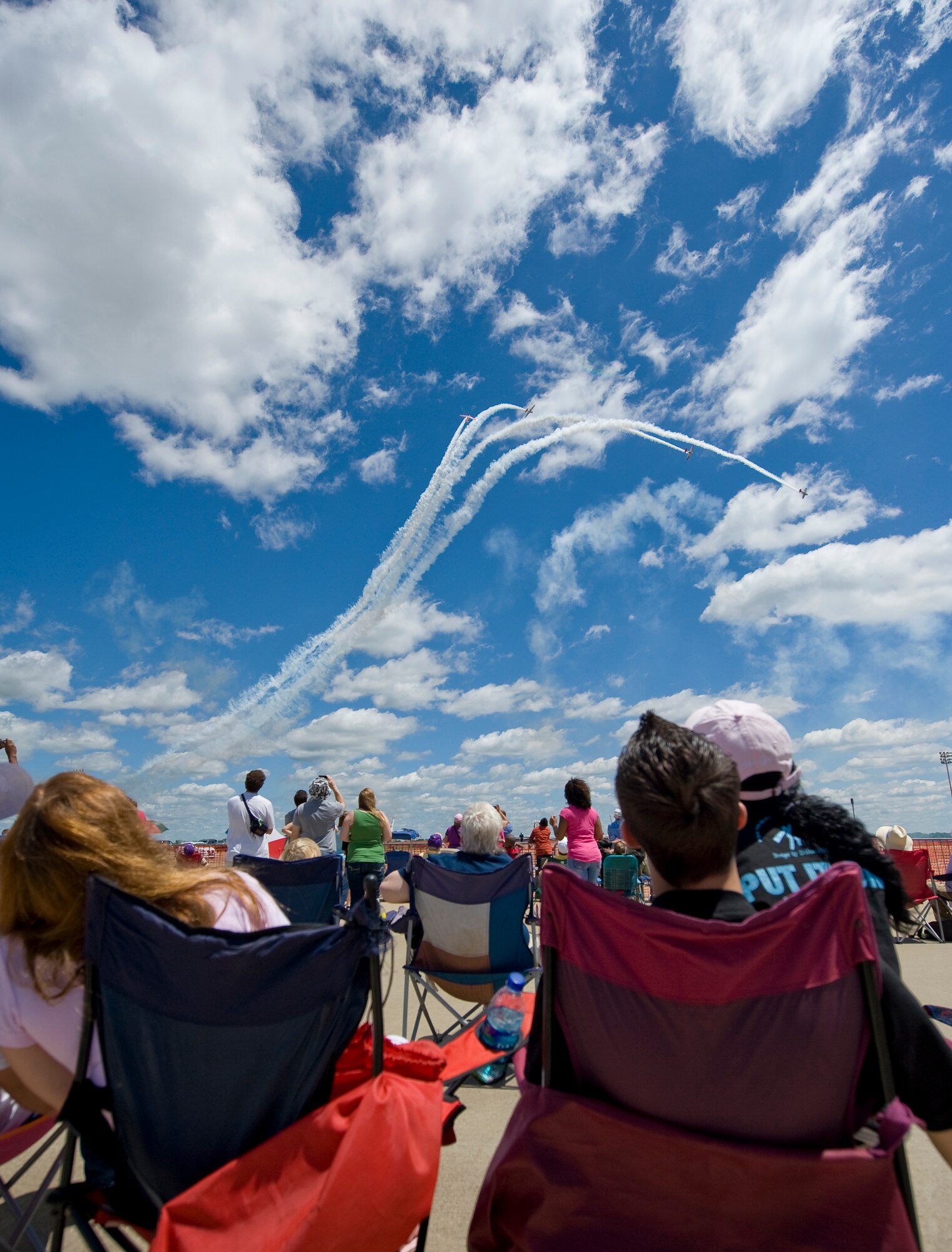 BARKSDALE AIR FORCE BASE, La. – Spectators at the 2010 Defenders of Liberty Air Show watch an aerial demonstration here Sunday, April 25. Several aircraft performed during the event, which gave Barksdale Airmen and the local community an opportunity to see first hand the capabilities of today’s Air Force. (U.S. Air Force photo by Senior Airman Chad Warren) (RELEASED)