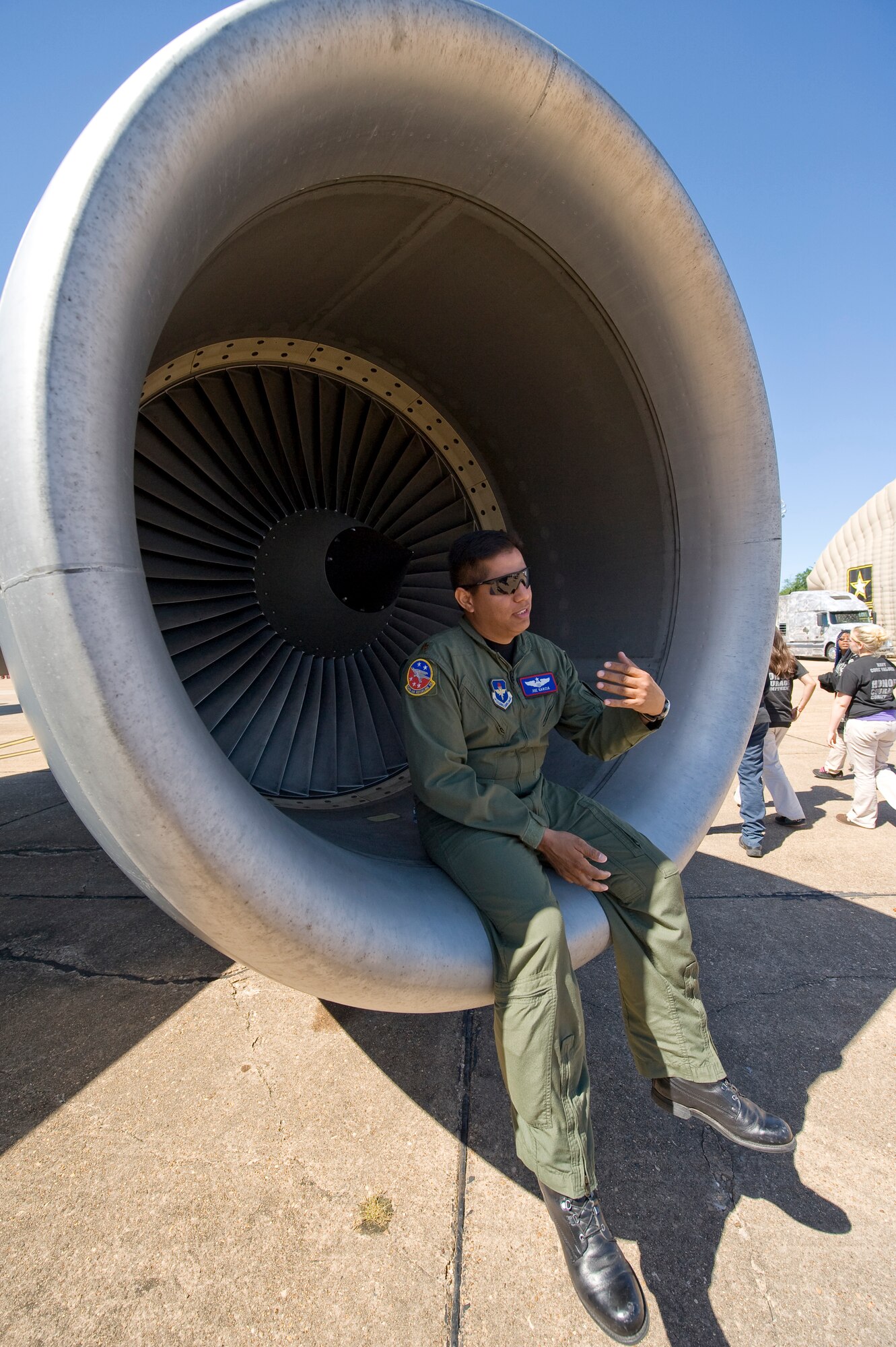 BARKSDALE AIR FORCE BASE, La. – Maj. Joe Garcia, a KC-135 pilot from Altus AFB, Okla., answers questions about his aircraft here Sunday, April 25. This refueling tanker was one of several aircraft displayed during the event, which gave Barksdale Airmen and the local community an opportunity to see first hand the capabilities of today’s Air Force. (U.S. Air Force photo by Senior Airman Chad Warren) (RELEASED)