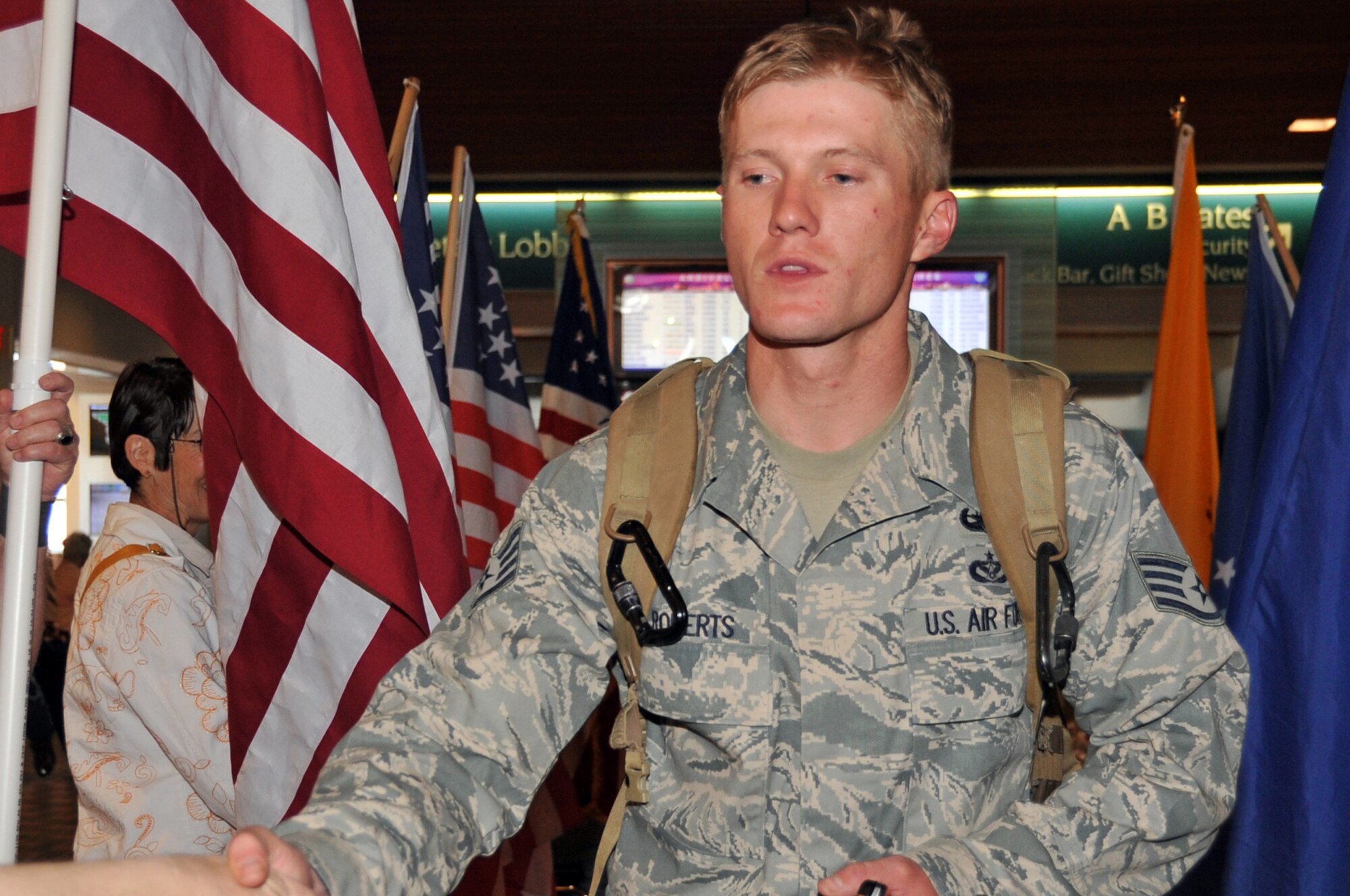 SSgt Joshua Roberts, EOD, was greeted by the Blue Star Mothers and troops from EOD upon his return from deployment April 15.

U.S. Air Force Photo by Elizabeth Martinez