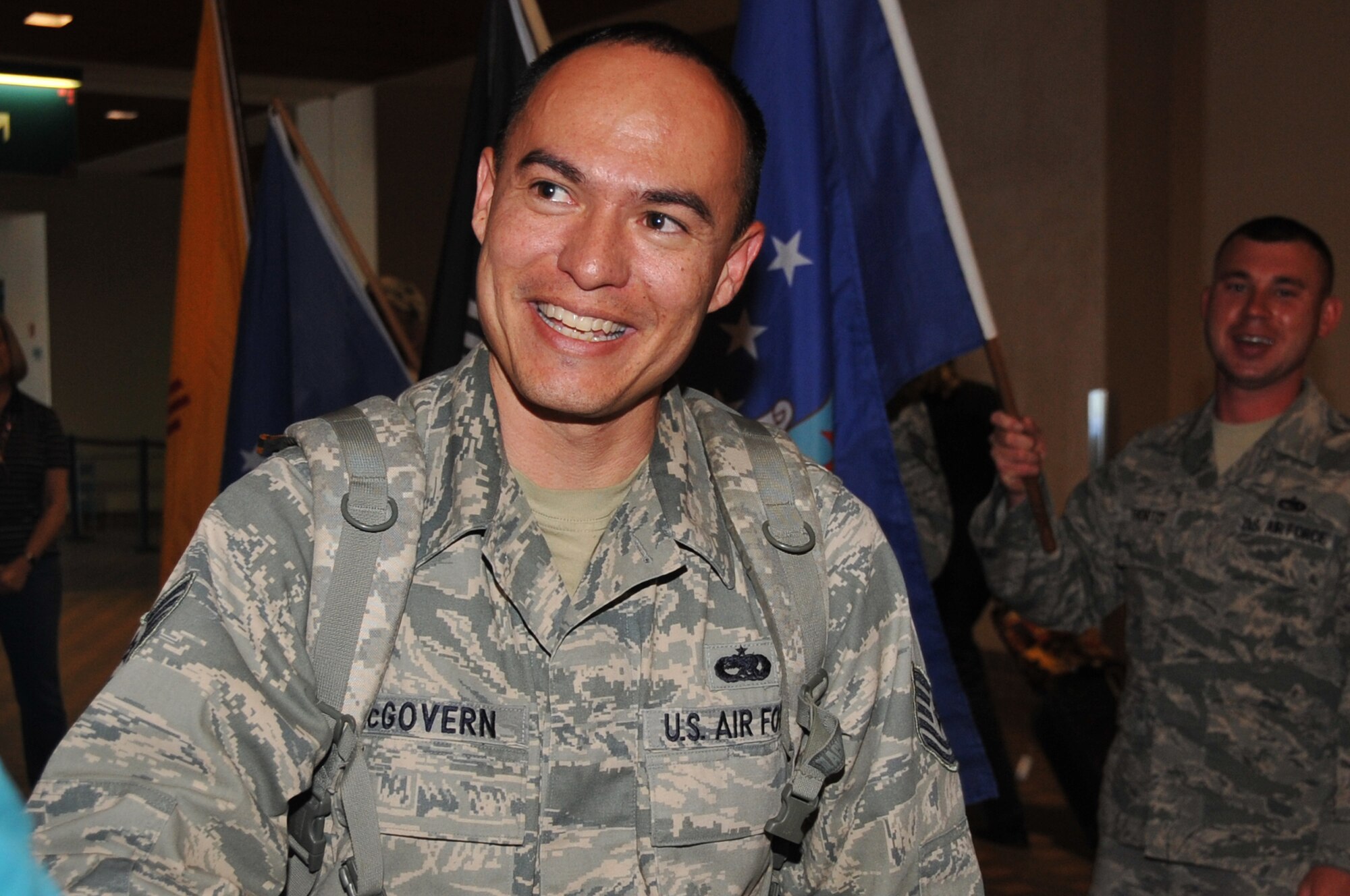 Tech. Sgt.Jeffrey A. McGovern, Air Education and Training Command, is welcomed by fellow Airmen and Blue Star Mothers upon his return from deployment April 9. U.S. Air Force Photo by Elizabeth Martinez
