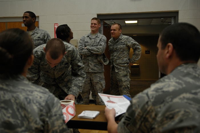 Members of Joint Team Charleston wait in line at the Fitness and Sports Center to donate blood at the Red Cross Blood Drive on Joint Base Charleston, S.C., April 21, 2010. The Red Cross hoped to receive at least 91 donations today to distribute to hospitals around South Carolina. The average shelf life of blood is 41 days. Due to the major surgeries conducted at the Medical University of South Carolina, the blood is always used and never thrown away. Often times there is a shortage and blood must be imported from other states. (U.S. Air Force Photo/Airman 1st Class Lauren Main)