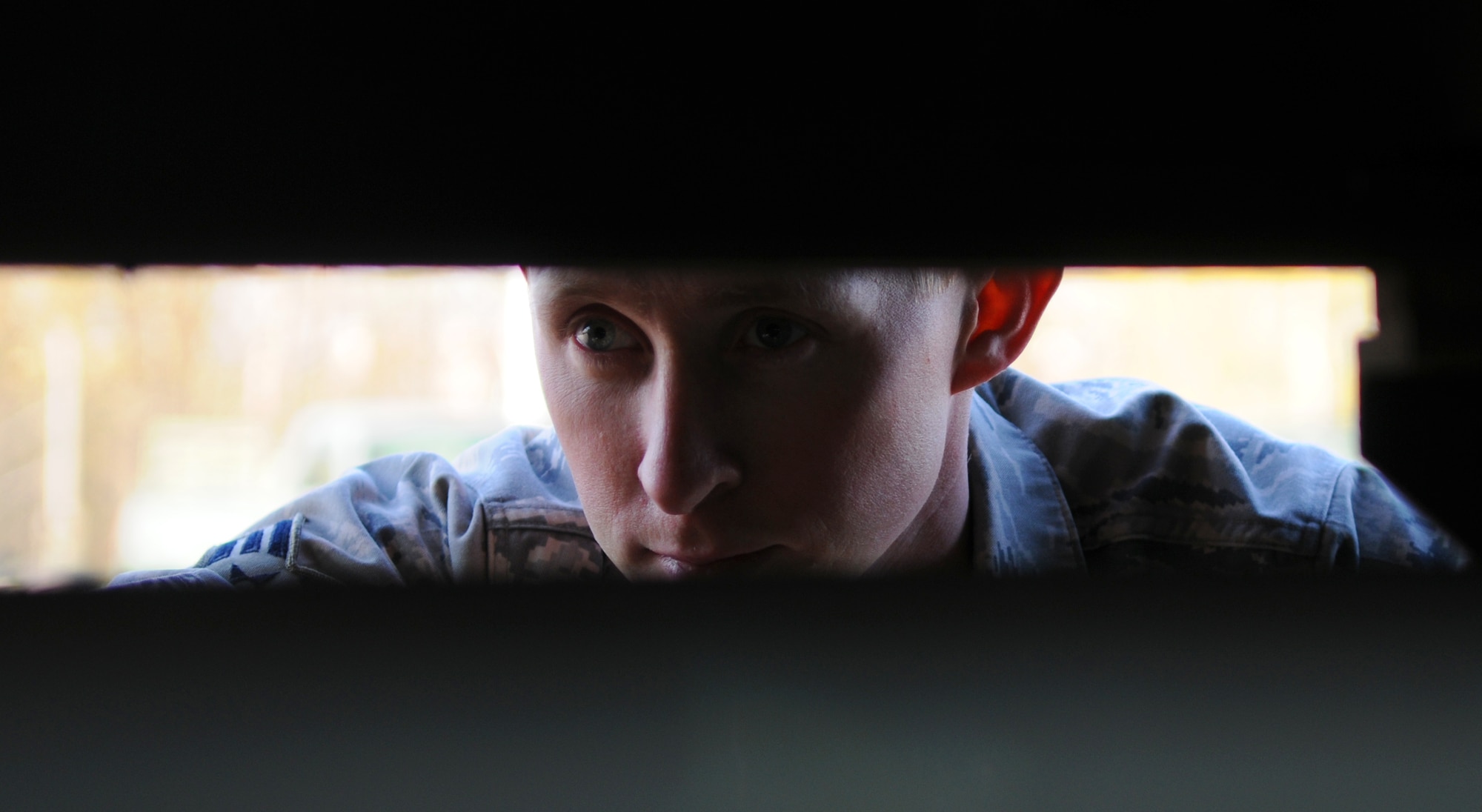 SPANGDAHLEM AIR BASE, Germany -- Senior Airman Daniel Huffman, 606th Air Control Squadron vehicle maintenance journeyman, checks the winch cables of an M1089 wrecker after a convoy during Exercise Emerging Fury April 23. The convoy gave Airmen hands-on experience and preparation for real-world convoys. (U.S. Air Force photo/Airman 1st Class Nick Wilson)