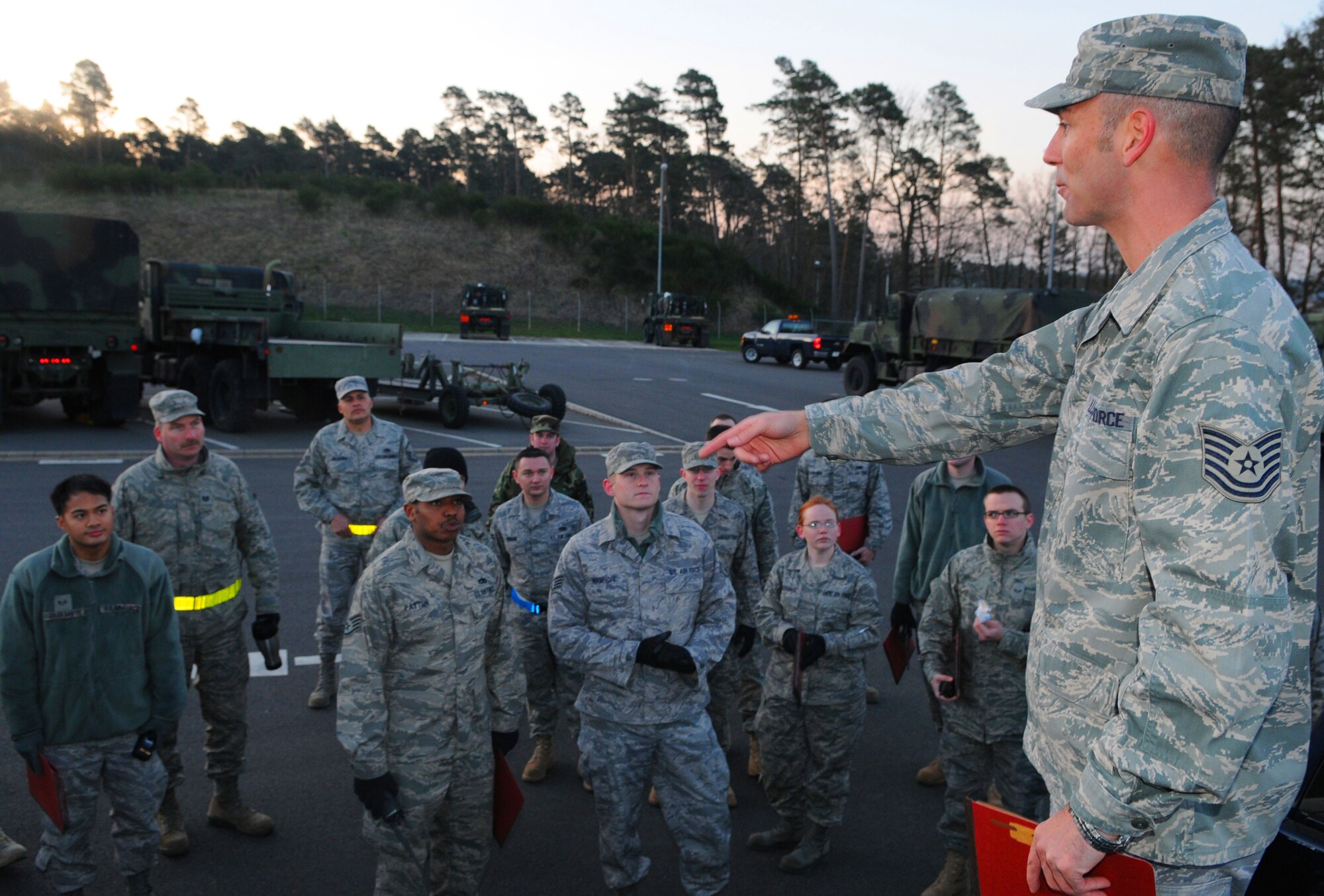 SPANGDAHLEM AIR BASE, Germany – Tech. Sgt. Randall Bach, right, 606th Air Control Squadron communications planning NCO in charge, gives a pre-convoy briefing to 606th ACS Airmen April 23. The convoy was part of Exercise Emerging Fury and gave Airmen hands-on experience and preparation for real-world convoys. (U.S. Air Force photo/Airman 1st Class Nick Wilson)