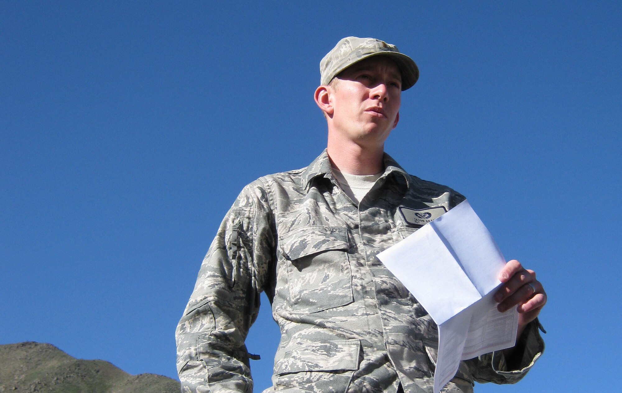 Second Lt. Jason Adams, Provincial Reconstruction Team Panjshir civil engineer, gives a mission briefing prior to departing Forward Operating Base Lion, Panjshir Province, Afghanistan, April 19. Adams and some other PRT engineers visited five work sites and held two meetings in what Adams called a ?successful day.? (U.S. Air Force Photo by 2nd Lt. Jason Smith, PRT Panjshir Public Affairs)