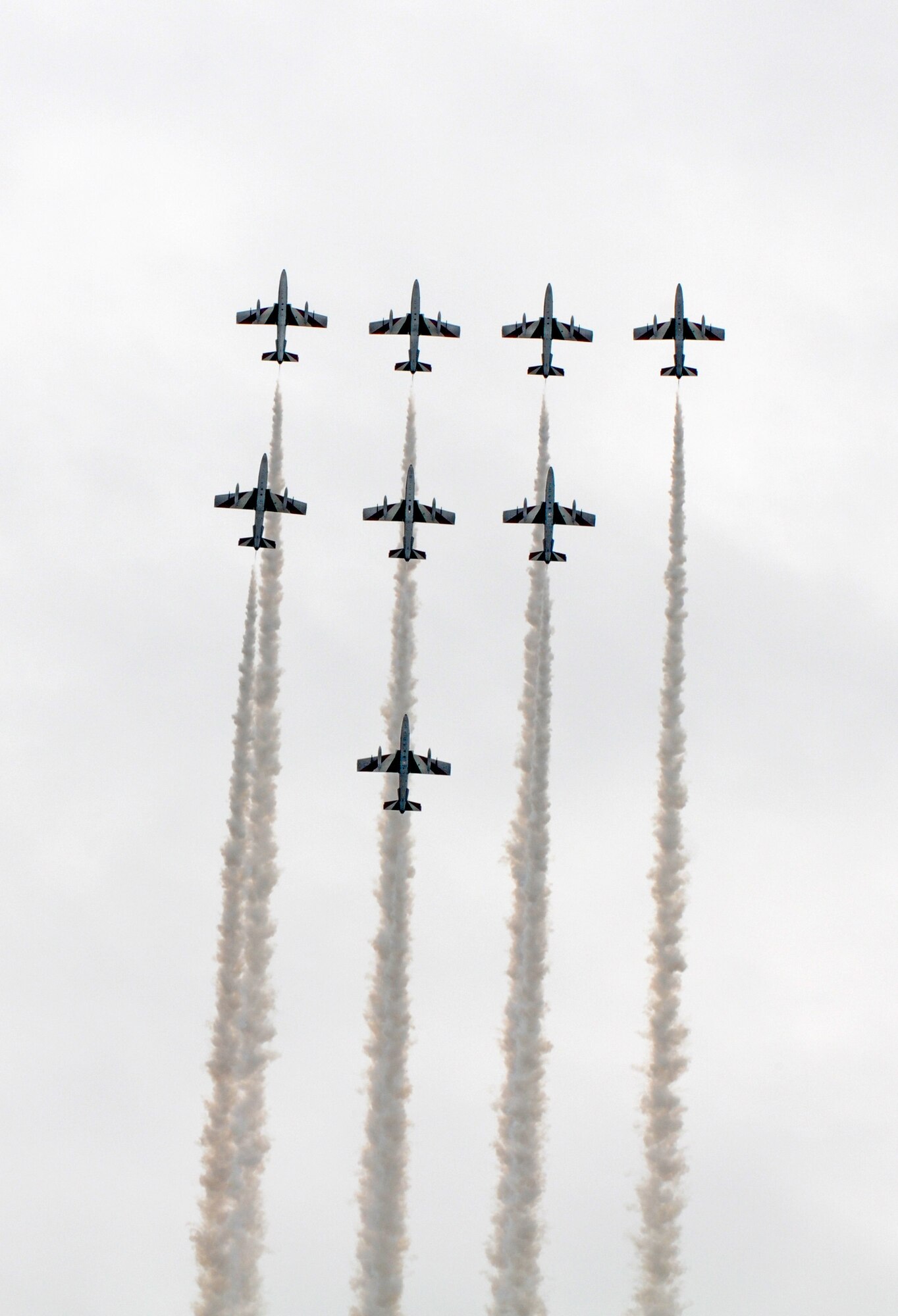 Jets from the Italian aerobatic team, Frecce Tricolori, perform a practice run April 23 over Aviano Air Base. Traditionally, the aerobatic team concludes their training here at Aviano the Friday prior to the beginning of their performance season. For more information on the Frecce Tricolori, visit www.freccetricolori.org. (U.S. Air Force photo/Staff Sgt. Justin Weaver)
