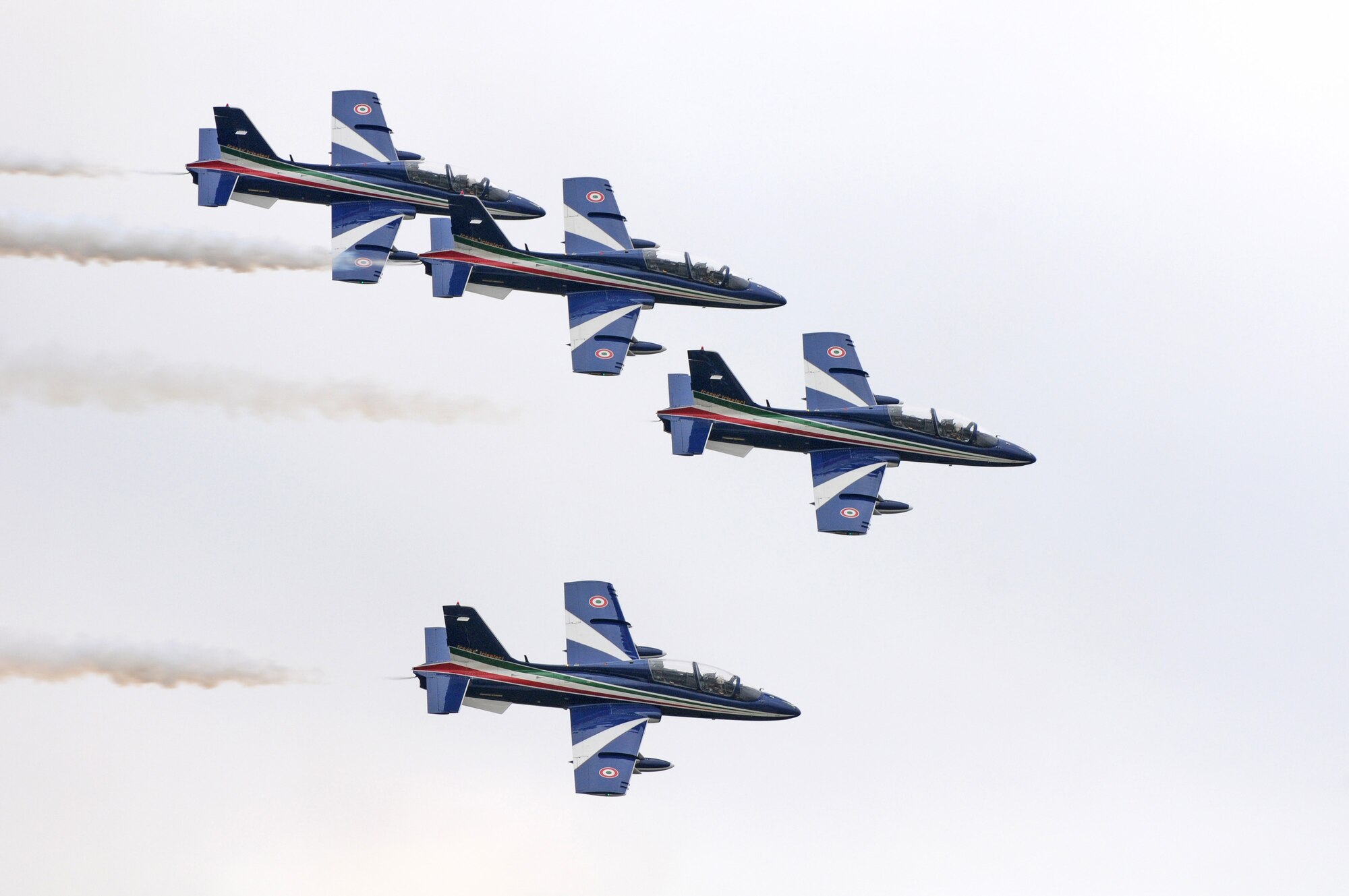 The Italian aerobatic team, Frecce Tricolori, perform a practice run April 23 over Aviano Air Base. Traditionally, the aerobatic team concludes their training here at Aviano the Friday prior to the beginning of their performance season. For more information on the Frecce Tricolori, visit www.freccetricolori.org. (U.S. Air Force photo/Staff Sgt. Justin Weaver)
