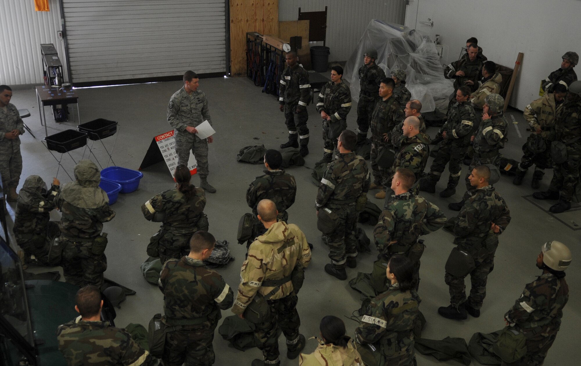 U.S. Air Force Master Sgt. David Gallagher, 86th Airlift Wing vice commanders inspection exercise development and inspection and readiness planner, conducts chemical, biological, radiological, nuclear and high yield explosives training in support of the upcoming Operations Readiness Inspection (ORI), Ramstein Air Base, Germany, April 23, 2010. Preparation for the ORI allows Air Force members to build on strengths and indentify weaknesses in order to better support future missions. (U.S. Air Force Photo by Airman 1st Class Caleb Pierce)