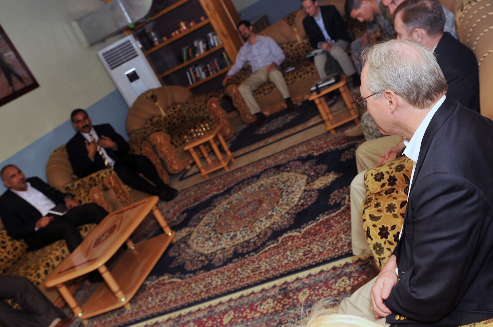 United States Ambassador to Iraq Christopher Hill meets with local nationals during his visit to the Provincial Reconstruction Team at Joint Base Balad, Iraq, April 23, 2010. As the August U.S. troop reduction date nears, PRT is working around the clock to prepare Iraq for its post drawdown future. During his visit, the ambassador was able to see the teams work first hand as he met with many Iraqi community leaders. (U.S. Air Force photo/Senior Airman Brittany Y. Bateman/Released)