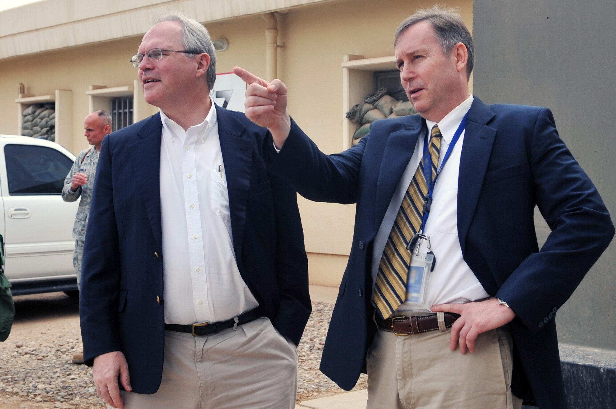 Ben Fluhart, Balad Provincial Reconstruction Team leader, greets the United States Ambassador to Iraq Christopher Hill, during his visit to the PRT at Joint Base Balad, Iraq, April 23, 2010. As the August U.S. troop reduction date nears, PRT is working around the clock to prepare Iraq for its post drawdown future. During his visit, the ambassador was able to see the team’s work first hand as he met with many Iraqi community leaders. (U.S. Air Force photo/Senior Airman Brittany Y. Bateman/Released)