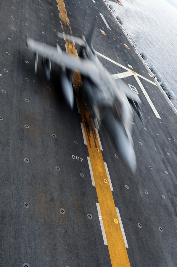 A pilot with Marine Attack Squadron 311 launches off the deck of the USS Peleliu April 26, 2010, to return to the Marine Corps Air Station in Yuma, Ariz., at the conclusion of the 15th Marine Expeditionary Unit’s final predeployment exercise. Six AV-8B Harriers and approximately 80 squadron Marines left Yuma April 15 to participate in their third and final predeployment training evolution. The exercise, which began April 16 and is scheduled to end April 27, included the entire 15th MEU. The squadron is slated to deploy with the 15th MEU in May, during which it will conduct counter-piracy operations in the Pacific and Indian Oceans.