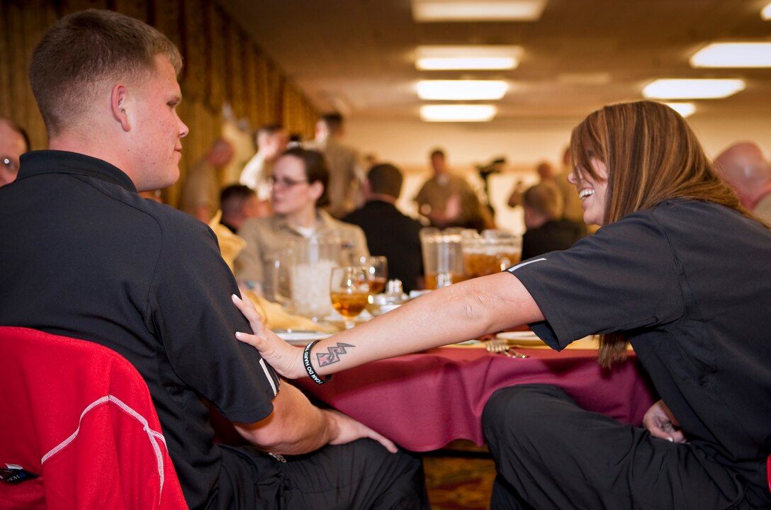 Athletes from the Wounded Warrior Regiment and staff celebrate the beggining of a two-week training camp April 27 at the Colorado Inn. The Olympic caliber, high-altitude training prepares the athletes for the Warrior Games May 10, against the other branches of service.