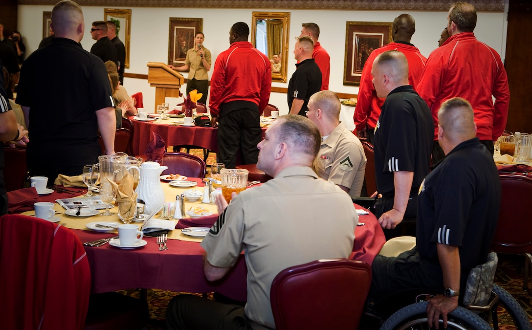 Athletes identify themselves amongst the supporting Marines, staff and guests during the training camp commencement dinner April 27, at the Colorado Inn. Approximately 50 Marines throughout the Wounded Warrior Regiment participate in the inaugural Warrior Games May 10. The Wounded Warrior Marines will be competing against the other military branches, though the Marines are the only service enduring two weeks of preparation.