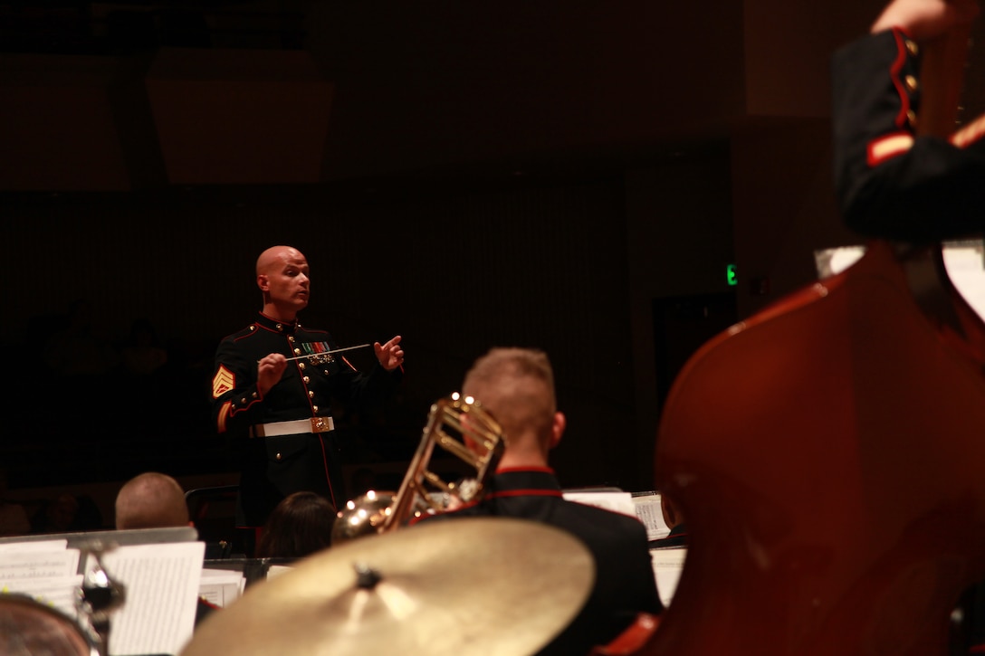 Staff Sgt. Kristofer P. Hutsell, the 2nd MAW Band enlisted conductor, leads the concert band at through a performance at Indiana Southeast University in New Albany, Ind., April 27. The band is currently preparing for its Christmas concert at the Cherry Point theater Dec. 10 at 7 p.m.