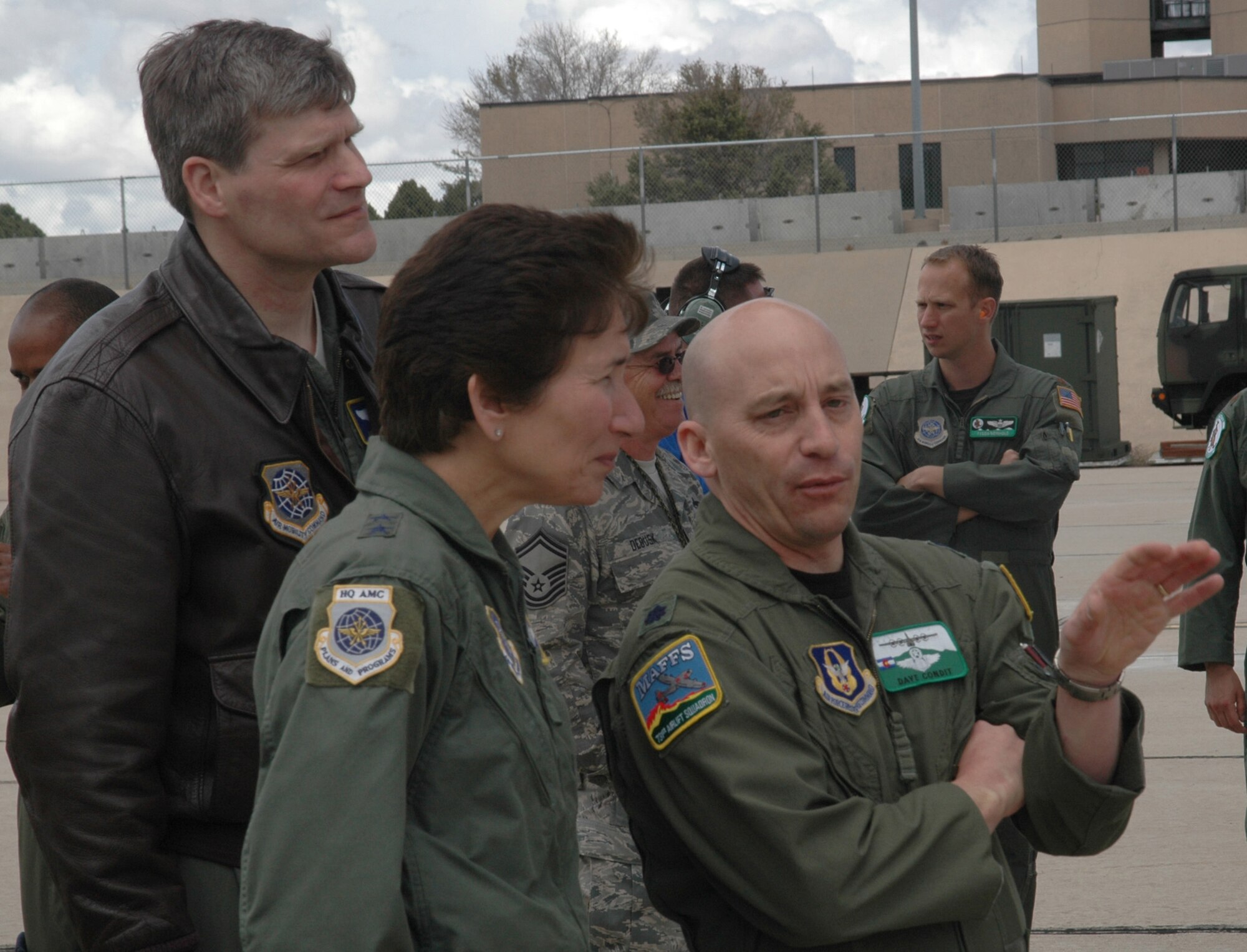 Lt. Col. David Condit (right) explains the benefits and challenges of aerial firefighting to Maj. Gen. Susan Desjardins, Air Mobility Command director of strategic plans, requirements and programs, as they observed a wet fire test of the Modular Airborne Firefighting System II, or "MAFFS II" unit April 22 at Peterson Air Force Base, Colo. The "MAFFS II" unit was test fired as part of the 302nd Airlift Wing's annual preparation for wildland fire season. The general visited the 302nd AW and its active duty associate unit, the 52nd Airlift Squadron, to learn more about the wing's successes of integration under the Air Force's Total Force Initiative program. Colonel Condit is the Air Force Reserve's MAFFS program coordinator and the 302nd AW's chief of safety. (U.S. Air Force photo/Staff Sgt. Stephen J. Collier)