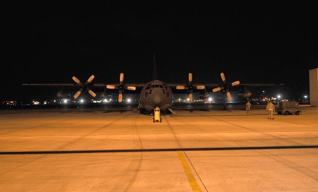 KADENA AIR BASE, Japan -- Maintainers from the 353rd Maintenance Squadron prepare an MC-130P Combat Shadow for arrival after the aircraft returned from a four-month deployment supporting combat operations in Afghanistan. The deployment marked the first time in unit history an aircraft from the 353rd Special Operations Group supported combat operations outside the Pacific theater. (U.S. Air Force photo by Tech. Sgt. Aaron Cram)