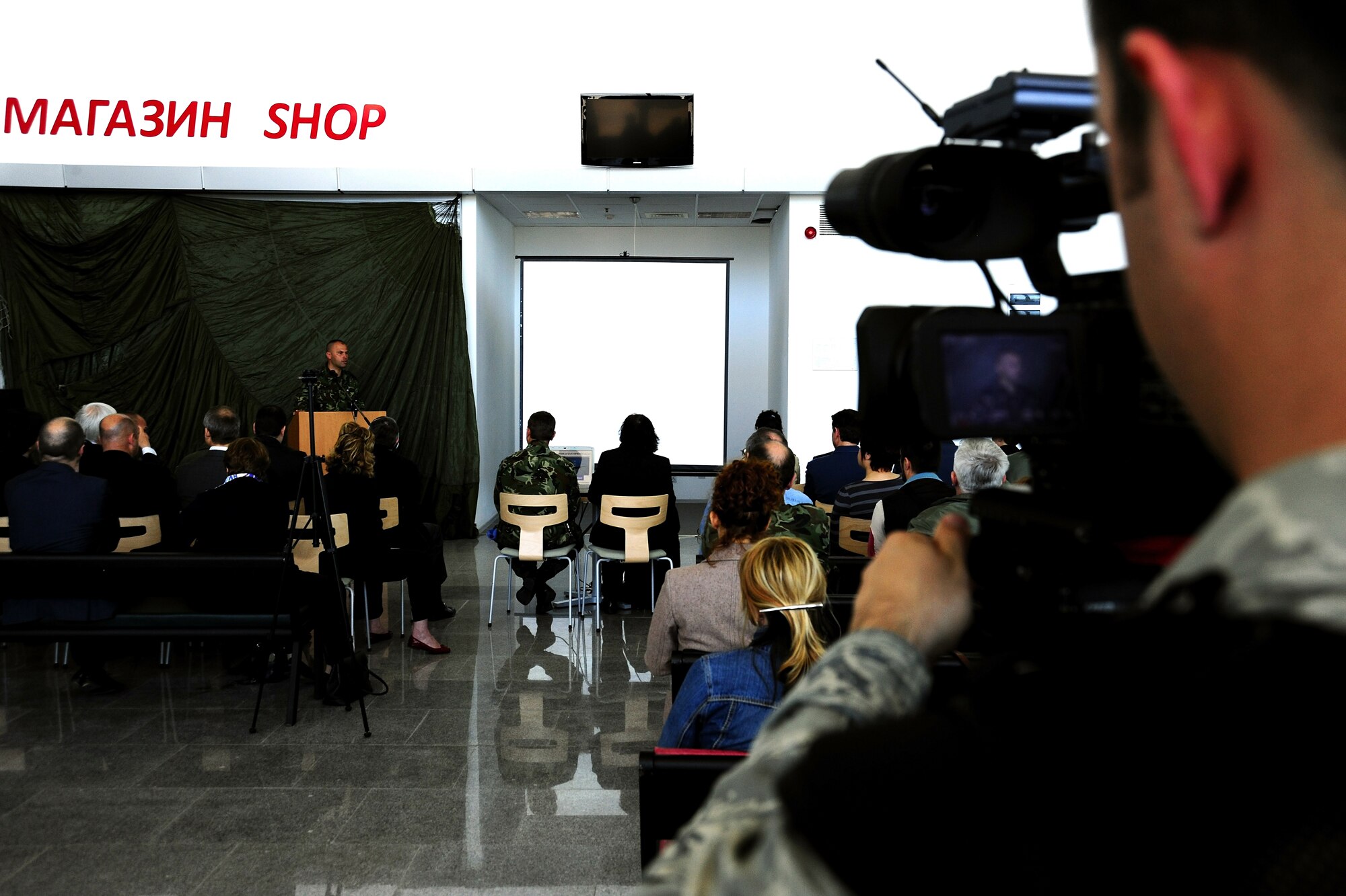 U.S. Air Force Staff Sgt. Larry Moore, 86th Airlift Wing Public Affairs broadcaster, captures the speech of Bulgarian Col. Ivaor Mateev, during Thracian Spring 2010’s media day at Plovdiv Airport, April 27, 2010. Thracian Spring is an exercise composed of aircrew, maintenance, airfield management, aerial port, security forces, and logistics personnel that combine their skill in an effort to build and strengthen the United States and Bulgarian Air Forces’ bond while improving interoperability with our partner NATO nation. (U.S. Air Force photo by Master Sgt. Quinton T. Burris)