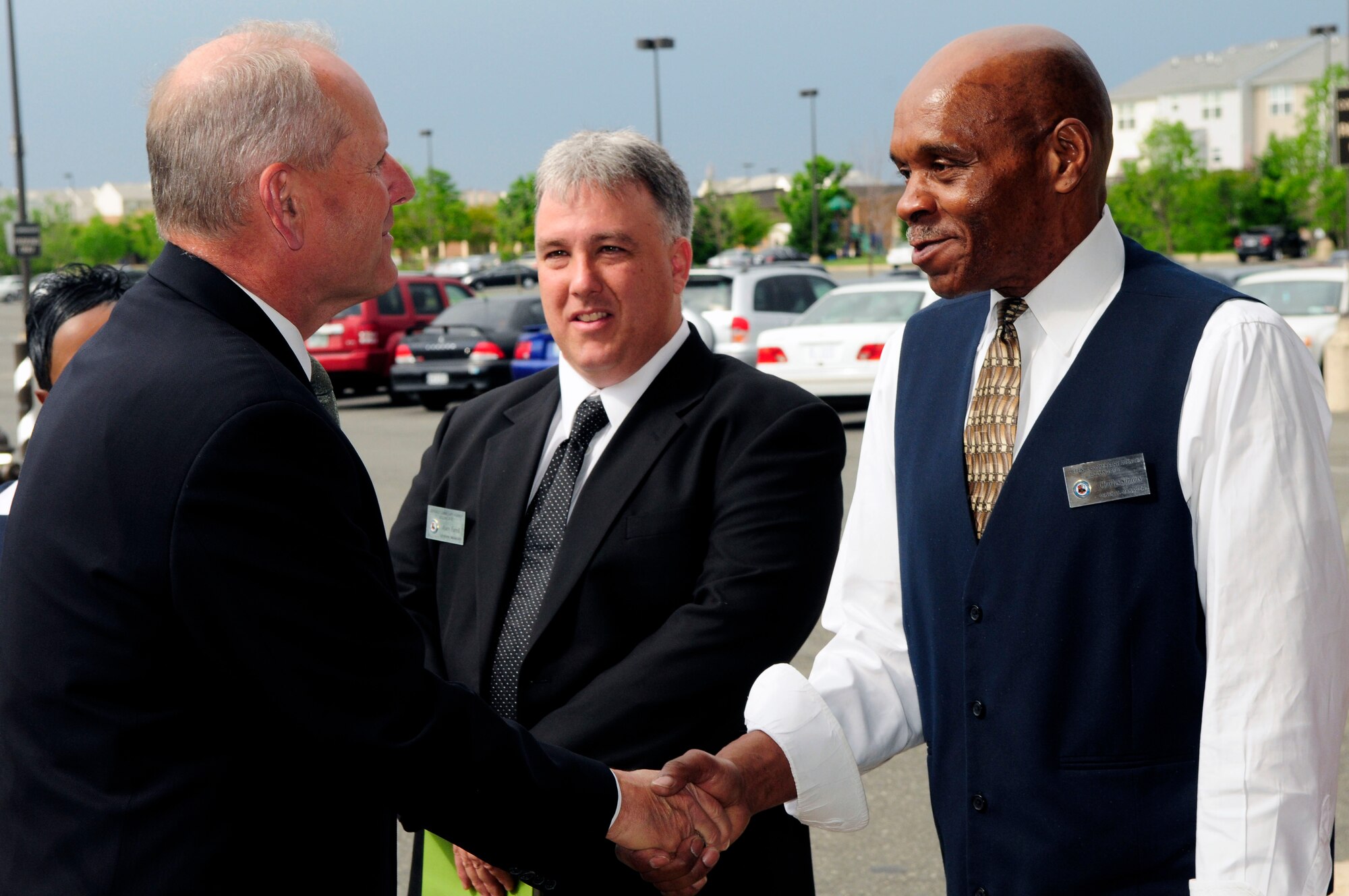 Philip Sakowitz, Jr., director and chief executive officer of the Defense Commissary Agency, speaks to Charles Simons, Bolling AFB Commissary general manager, April 24 at the Bolling Commissary. Mr. Sakowitz took the day to visit Air Force commissaries in the National Capital Region. (U.S. Air Force photo by Staff Sgt. Raymond Mills)