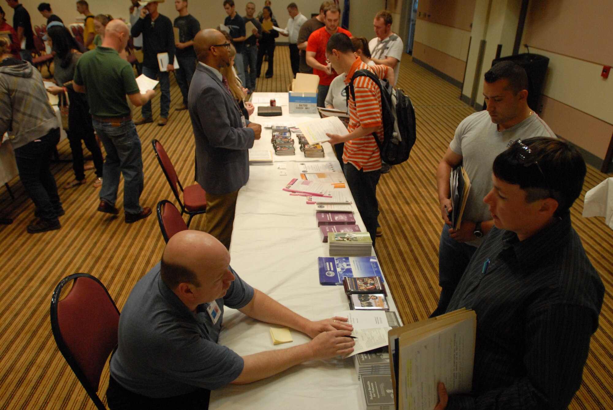 Members of the Individual Ready Reserve meet with representatives from the Veterans Administration to ask questions about VA benefits during an IRR Muster at Goodfellow AFB, Texas April 23.  A muster is held each year for individuals in the IRR to update personal information and receive information on benefits. (U.S. Air Force photo by Master Sgt. Randy Mallard)