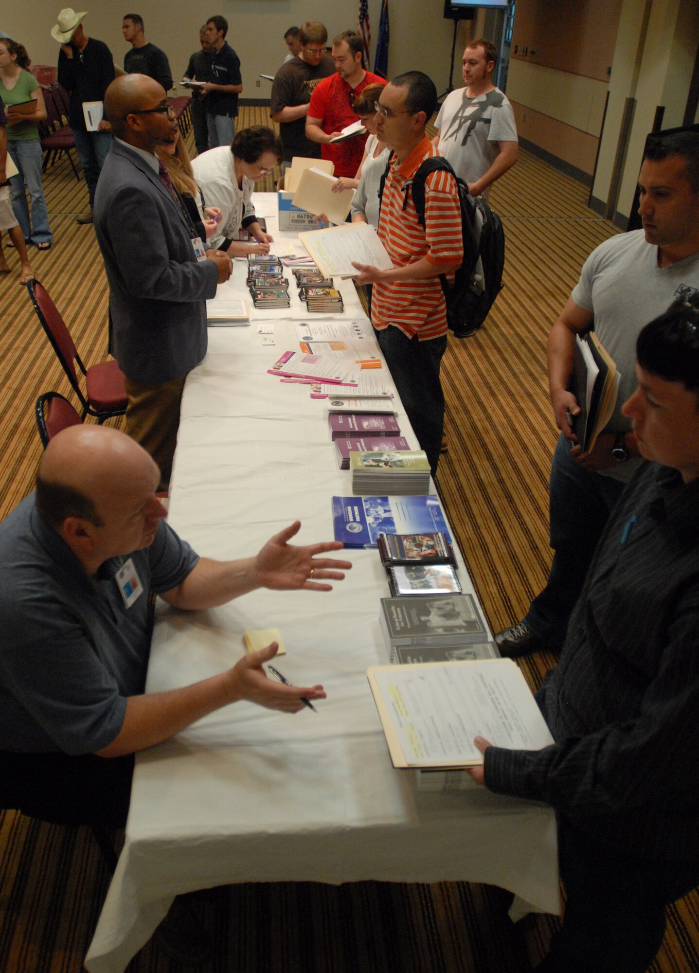 Members of the Individual Ready Reserve meet with representatives from the Veterans Administration to ask questions about VA benefits during an IRR Muster at Goodfellow AFB, Texas April 23.  A muster is held each year for individuals in the IRR to update personal information and receive information on benefits. (U.S. Air Force photo by Master Sgt. Randy Mallard)