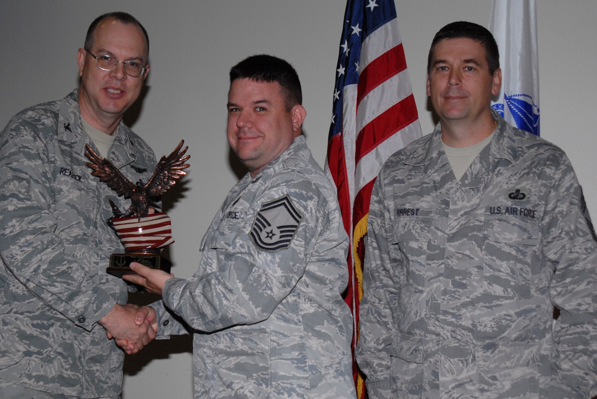 GOODFELLOW AIR FORCE BASE, Texas -- Senior Master Sgt. Robert Burke, 17th Comptroller Squadron, receives Team Goodfellow Senior NCO of the Quarter during the wing quarterly award ceremony, April 27, 2010. (U.S. Air Force photo illustration/ Staff Sgt. Laura R. McFarlane) 
