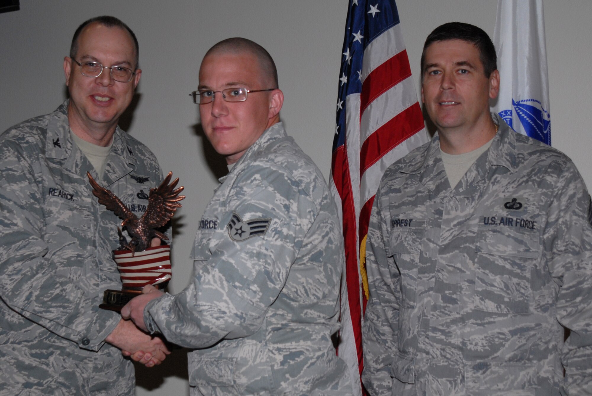 GOODFELLOW AIR FORCE BASE, Texas -- Senior Airman Mikael Rose, 17th Security Forces Squadron, receives Team Goodfellow Junior Enlisted of the Quarter during the wing quarterly award ceremony, April 27, 2010. (U.S. Air Force photo/Staff Sgt. Laura R. McFarlane)

