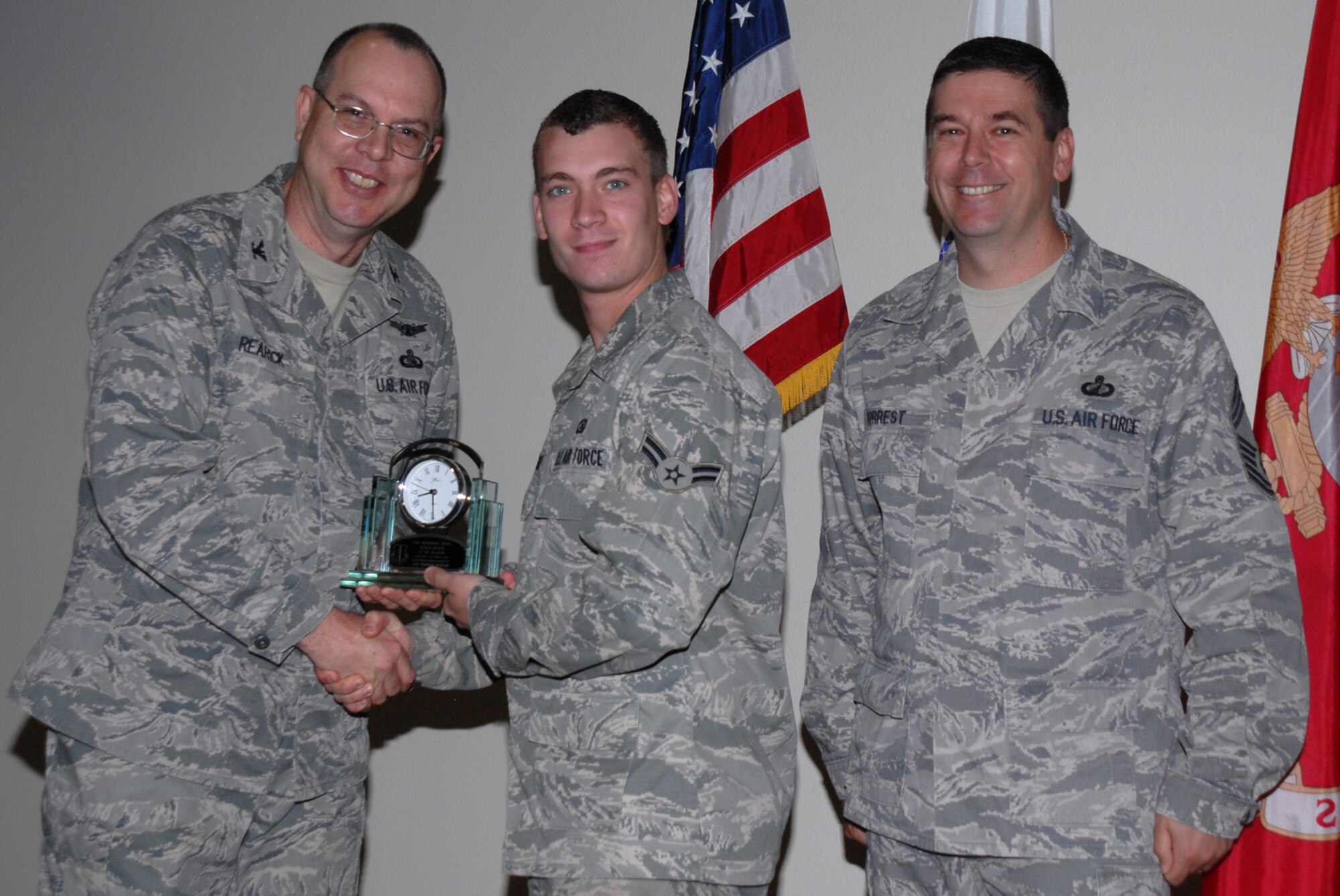 GOODFELLOW AIR FORCE BASE, Texas -- Airman 1st Class Thomas Sadler, 17th Training Support Squadron, receives 17th Training Wing Dorm Room of the Quarter during the wing quarterly award ceremony, April 27, 2010. (U.S. Air Force photo/Staff Sgt. Laura R. McFarlane)
