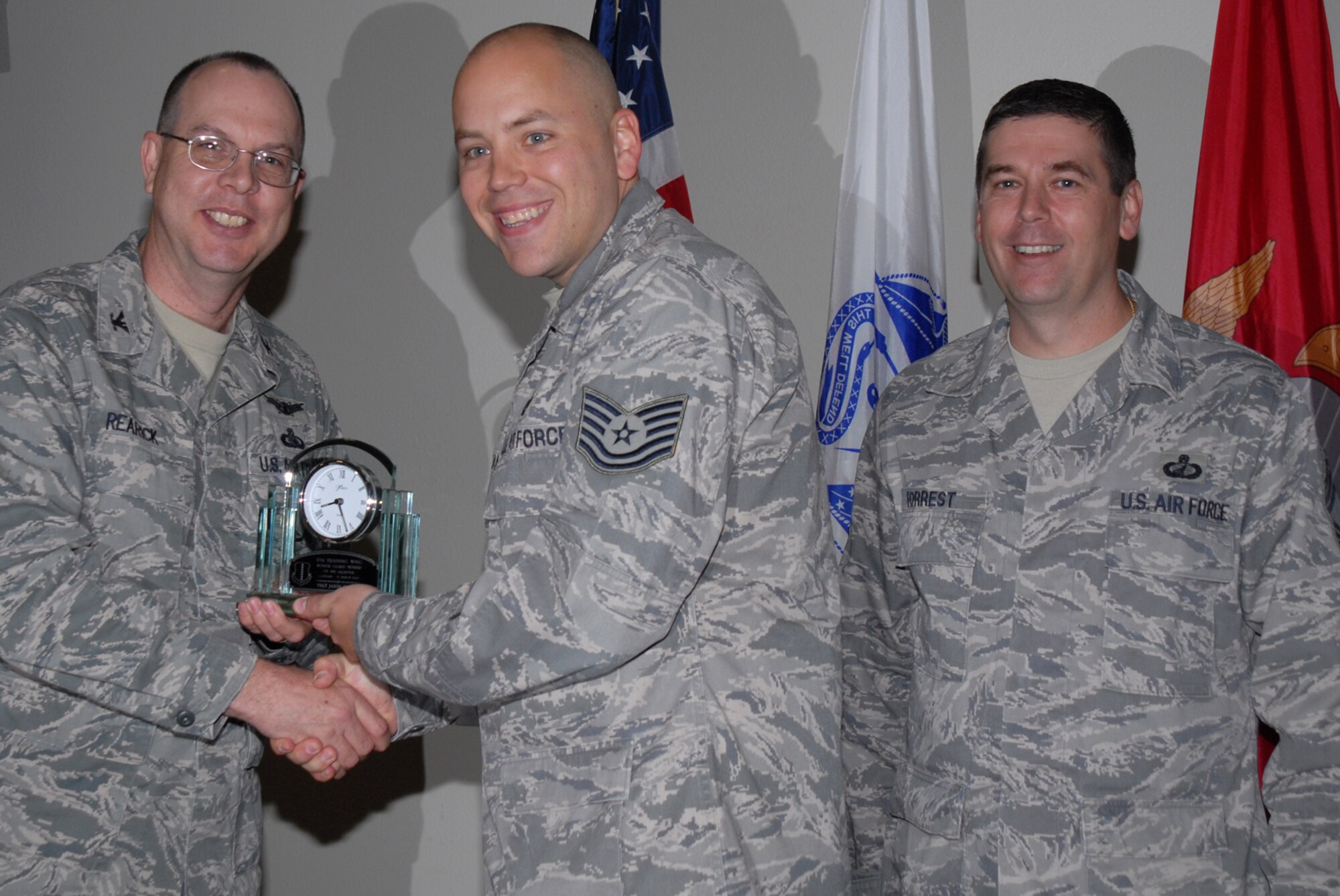GOODFELLOW AIR FORCE BASE, Texas -- Tech. Sgt. Jason Jordan, 316th Training Support Squadron, receives 17th Training Wing Honor Guard of the Quarter during the wing quarterly award ceremony, April 27, 2010. (U.S. Air Force photo/Staff Sgt. Laura R. McFarlane)
