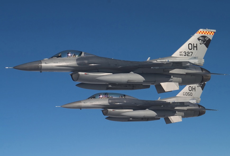 SPRINGFIELD AIR NATIONAL GUARD BASE, Ohio – Two 178th Fighter Wing F-16 Fighting Falcons fly over Springfield Air National Guard Base in Ohio. The 178th Fighter Wing trains active-duty Air Force, Air National Guard, and Air Force Reserve pilots to fly F-16 Fighting Falcons. The wing is one of three stateside National Guard units that is designated as a training unit to prepare future F-16 pilots for worldwide missions. (U.S. Air Force photo/Senior Master Sgt. Joseph R. Stahl)