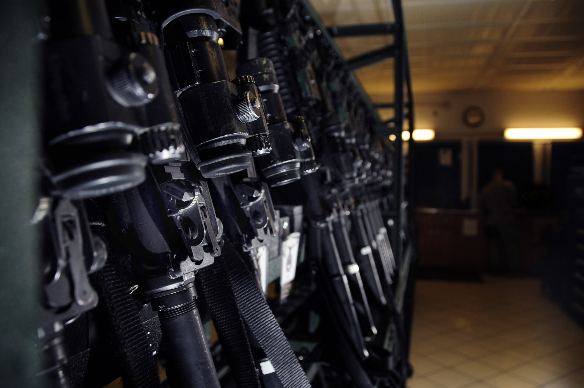 ELLSWORTH AIR FORCE BASE, S.D. -- A rack of M-4 carbine rifles are stored in the 28th Security Forces Squadron armory while not in use.  The M-4 is a lighter, more compact, version of the M-16A2 rifle. (U.S. Air Force photo/Airman 1st Class Anthony Sanchelli)
