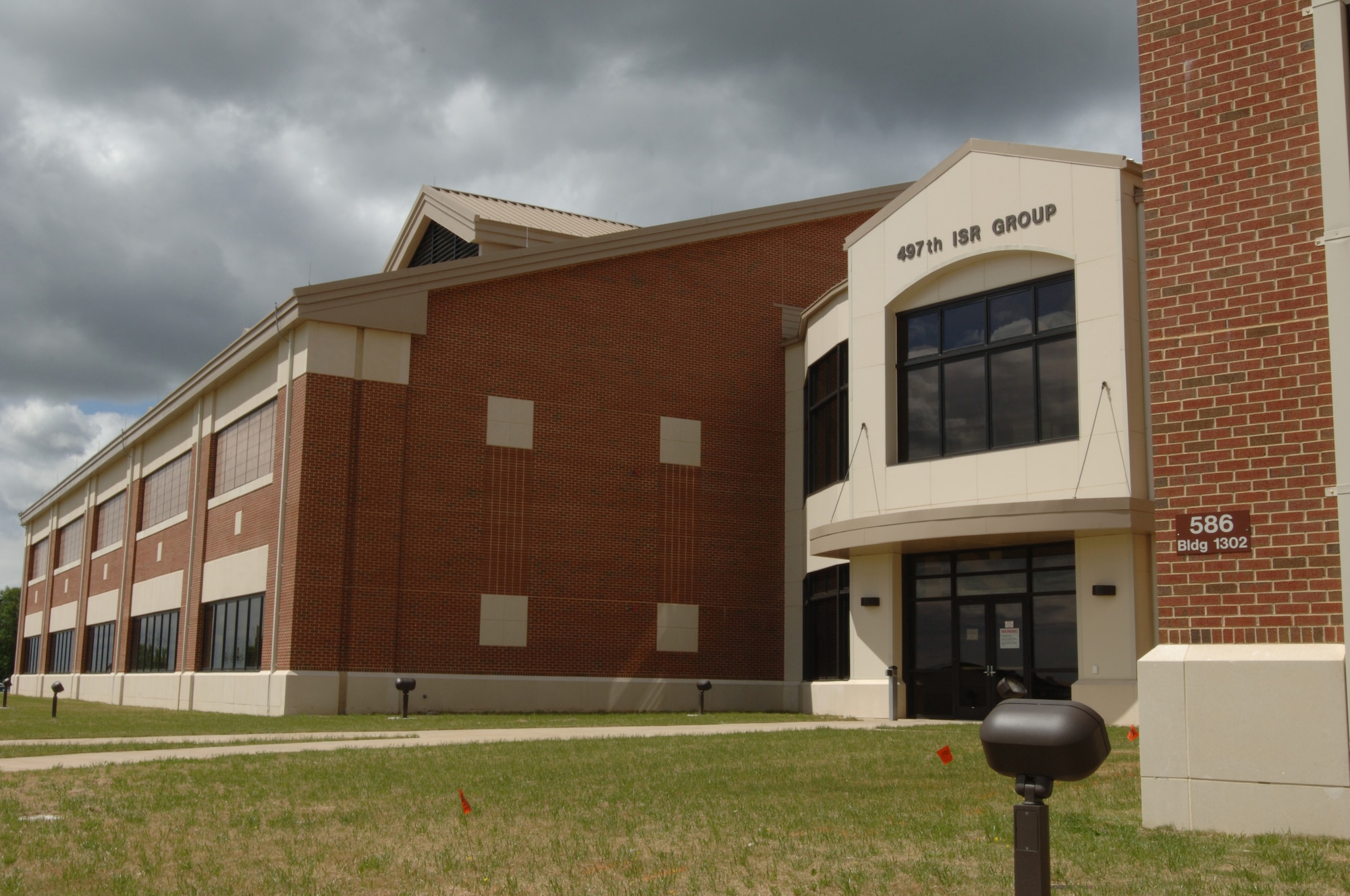 LANGLEY AIR FORCE BASE, Va. -- The new 497th Intelligence, Surveillance, and Reconnassaince Group complex consolidates the groups' Air Force Distributed Common Ground Systems, assets and more than 700 personnel from six different buildings into one centralized location. The move cost more than $75 million, and is the result of more than seven years of planning and development. (U.S. Air Force photo/Airman 1st Class Jason J. Brown)