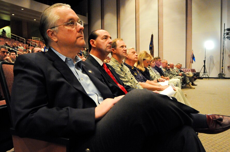 State Sen. David L. Williams, State Rep. Rocky Adkins, the Kentucky Air Guard's Col. Steve Bullard and Thunder Over Louisville Air Show producer Mr. Wayne Hettinger listen as Dennis M. McCarthy, assistant secretary of defense for Reserve Affairs, praises the contributions of Kentucky Airmen during a Hometown Heroes ceremony held April 17, 2010 at Louisville Male High School in Louisville, Ky. (U.S. Air Force photo/Senior Airman Maxwell Rechel)