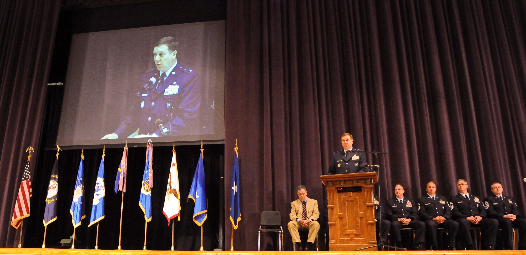 Kentucky's adjutant general, Maj. Gen. Edward Tonini, describes the contributions of the more than 900 members of the Kentucky Air National Guard who have deployed world wide for combat operations since Sept. 11, 2001 during a Hometown Heroes ceremony held April 17, 2010 at Louisville Male High School in Louisville, Ky. (U.S. Air Force photo/Tech. Sgt. Dennis Flora)