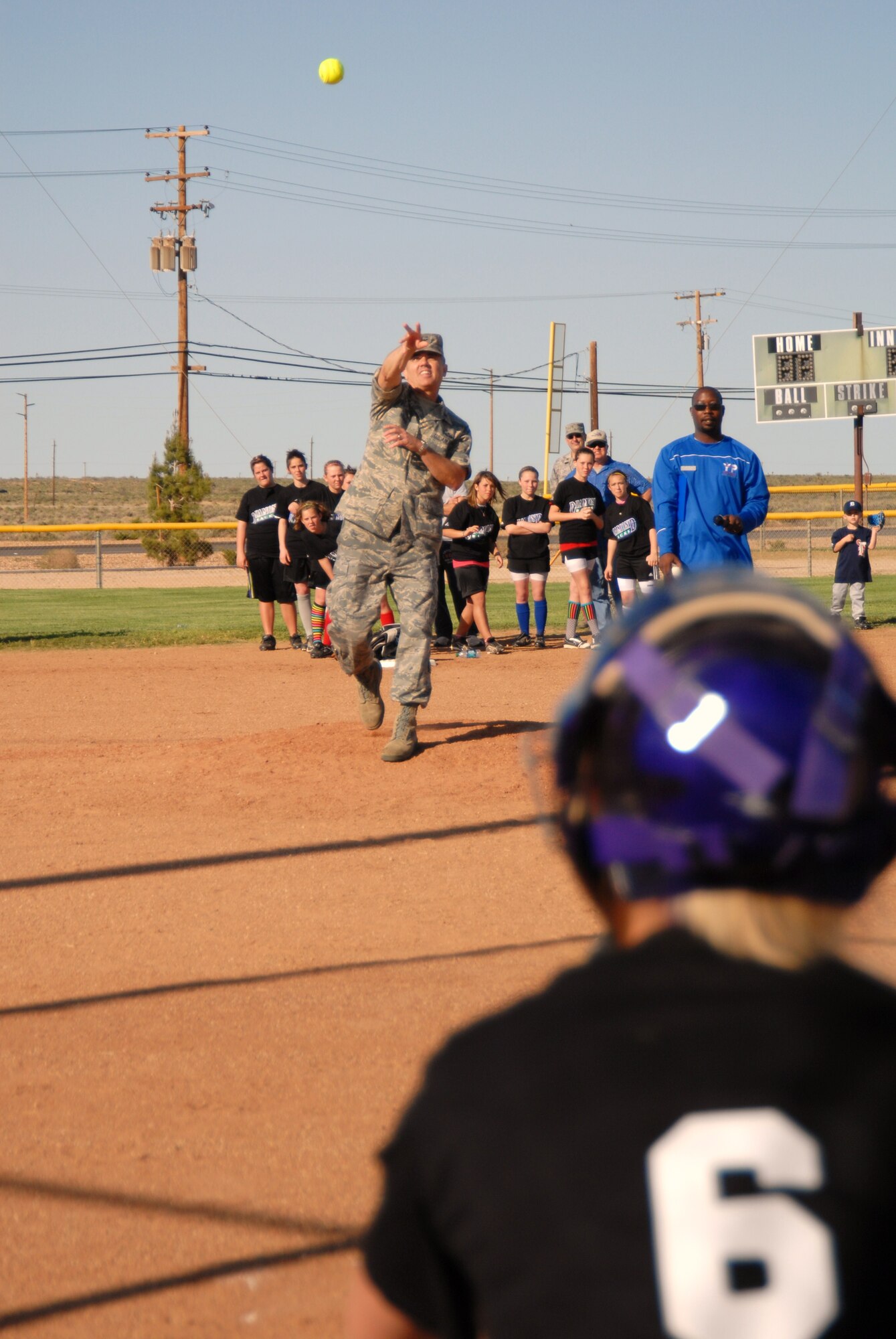 EDWARDS AIR FORCE BASE, Calif. – Under clear skies April 23, the Edwards Little League season opened at Wenning Field with Col. Darrell Riggs, 95th Mission Support Group commander, throwing out the first pitch to Diamondbacks catcher, Miranda Brader.  There are 148 players on 13 teams playing this 2010 season at Edwards.  The Devil Rays won the first game of the season in three innings 10 – 9. 

Emil Graves, 95th Family Support Services Youth Sports and Fitness director, said there are still openings for players who have not signed up yet to play this season.  “Our main goal is to provide activities for Edwards' youth.  With the constant turn-over of servicemembers comes the constant turn-over of youth.  Thus, there is no closing date for sign-ups,” he said.

To sign up, or for questions, call Mr. Graves at 277-8961.  (Air Force photo by Stephen K. Robinson) 
