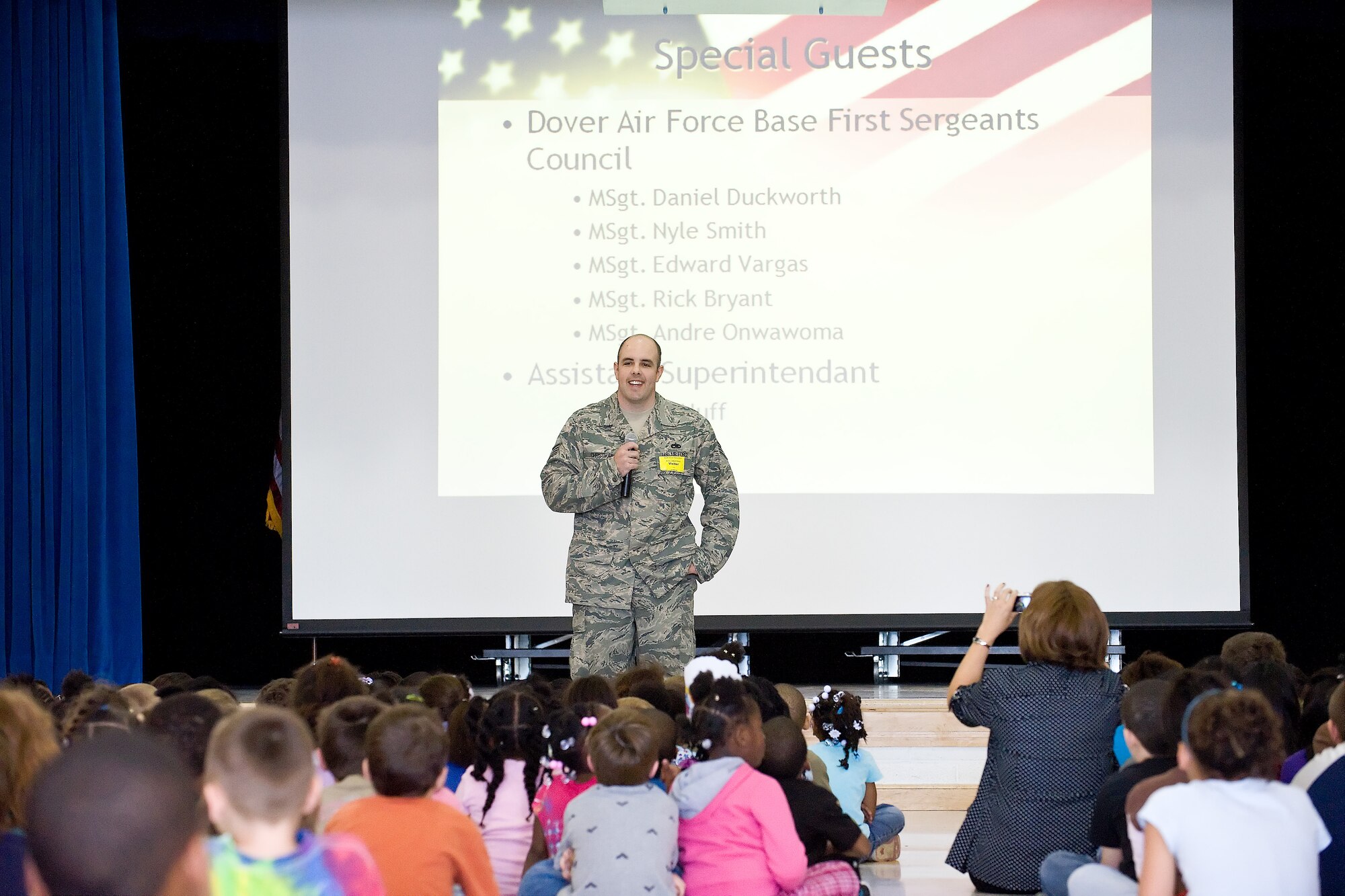 Staff Sergeant Charles Christman, 436th Maintenance Squadron, gives a speech about the role of a first sergeant during the Flag Donation Ceremony at South Dover Elementary School April 16. (U.S Air Force photo/Roland Balik)