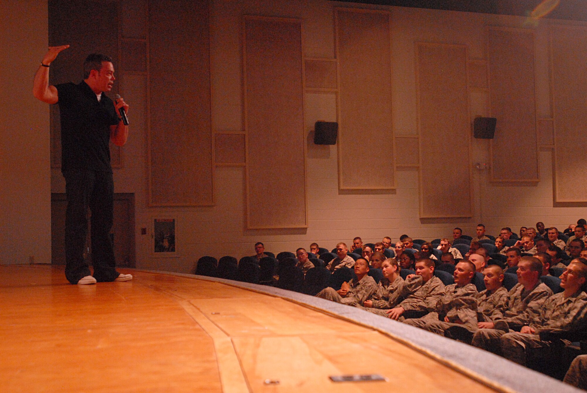 Bernie McGrenahan entertained more than 650 members here with three almost back to back shows at the base theather April 21. Mr. McGrenahan, who has appeared in many late night comedy specials, came here to talk about the dangers of alcohol, drugs and sexual assualt and harrasment. (U.S. Air Force photo/ Senior Airman Tong Duong)