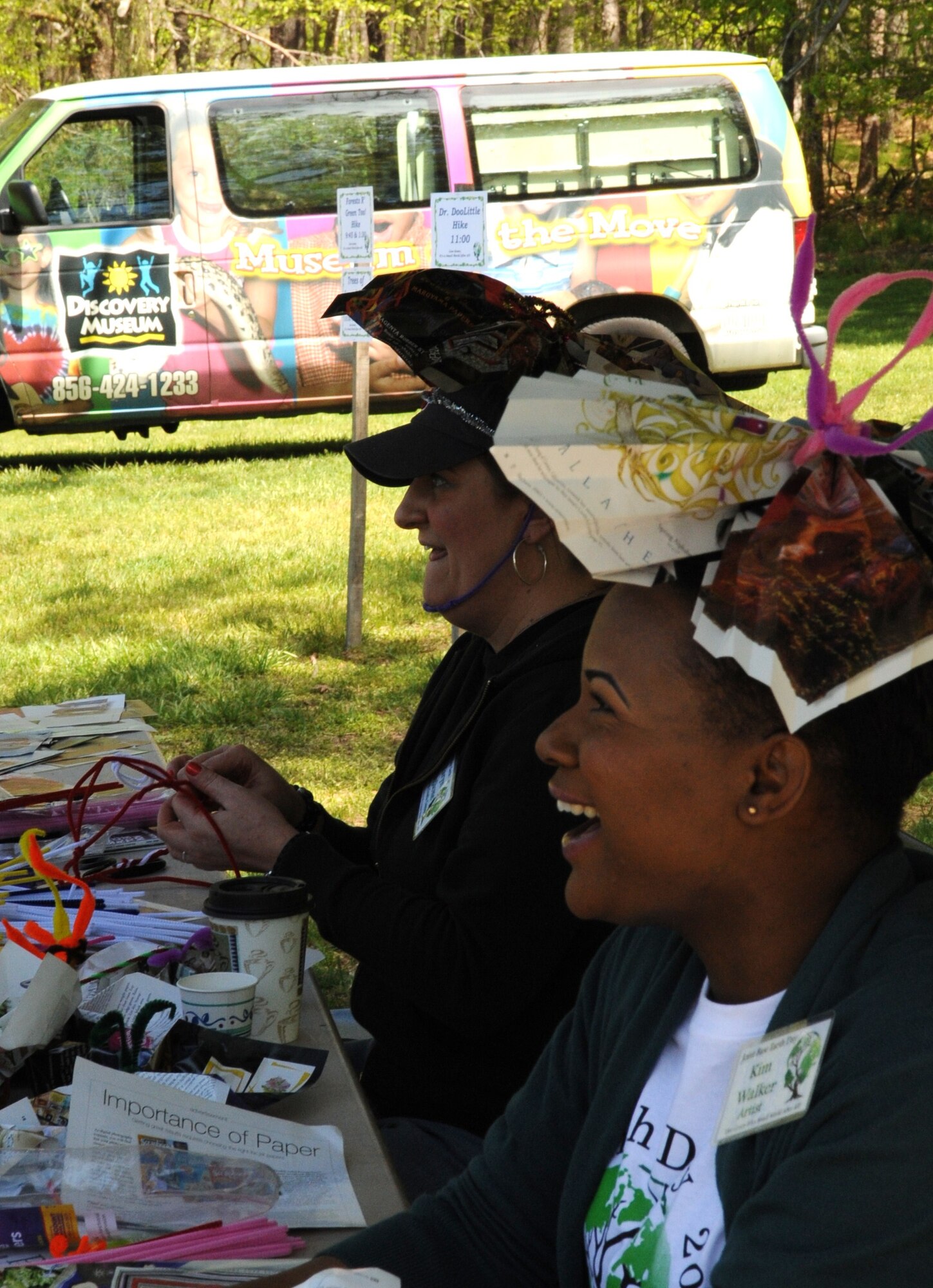 Kim Walker and Taryn Paglione, artists from the installation's Arts and Crafts Center, make butterflies out of pipe cleaners in celebration of Earth Day April 24 here. Dix Earth Day was the last of three celebrations across Joint Base McGuire-Dix-Lakehurst. (U.S. Air Force photo/2nd. Lt. Carolyn Glover)