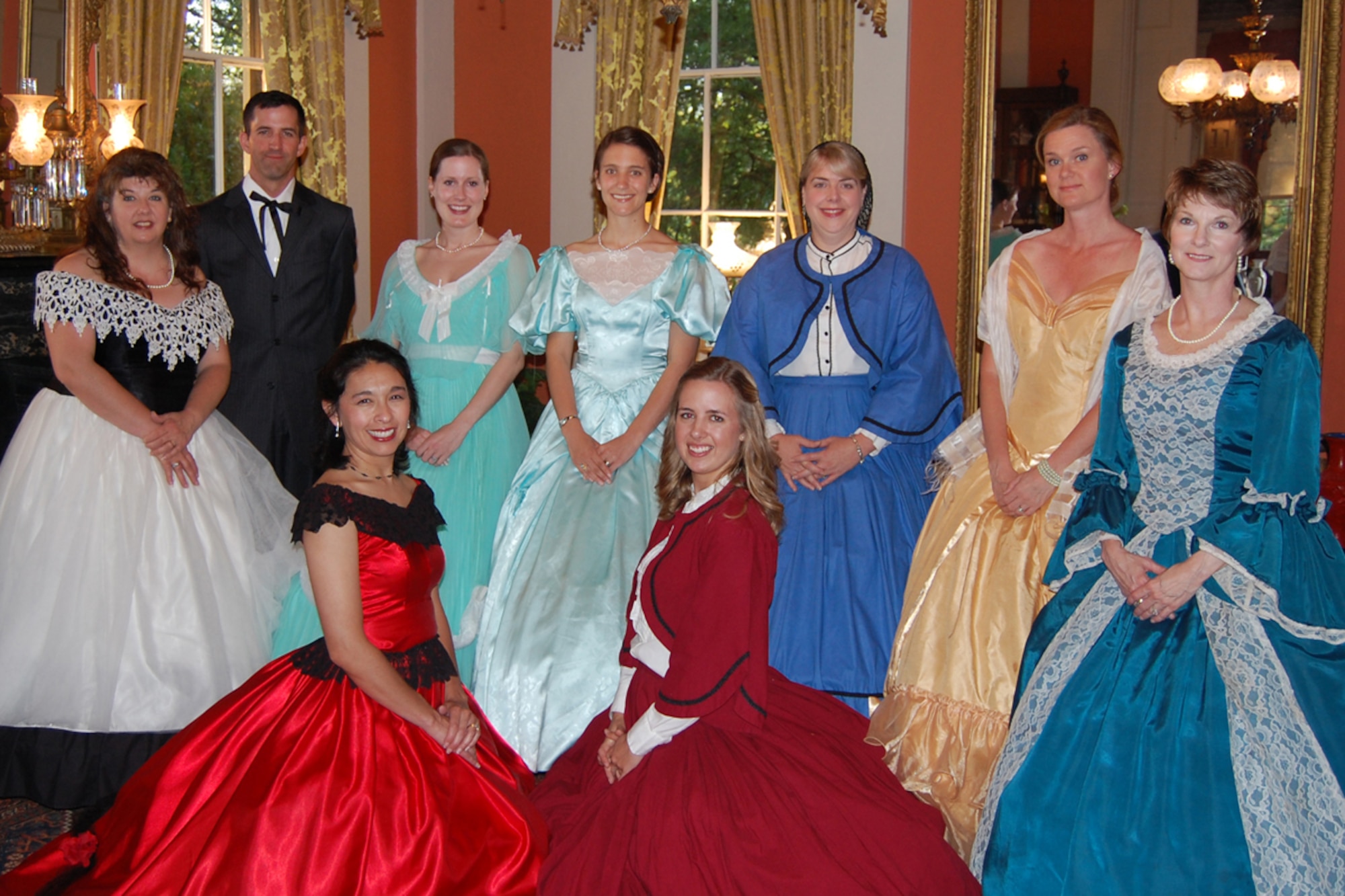 Volunteers at Riverview, an antebellum home featured in the Columbus Pilgrimage, stand for a group shot. Volunteers in the photo are: Elizabeth Owens, Maj. Evan Whitehouse, 1st Lt. Kristi Sieben, 1st Lt. Robyn Meinhard, Amy King, Laura Dunser, Deveon Sudduth, bottom row) Susie Oglesbly, 2nd Lt Sara Greco. (U.S. Air Force photo/Elizabeth Owens).