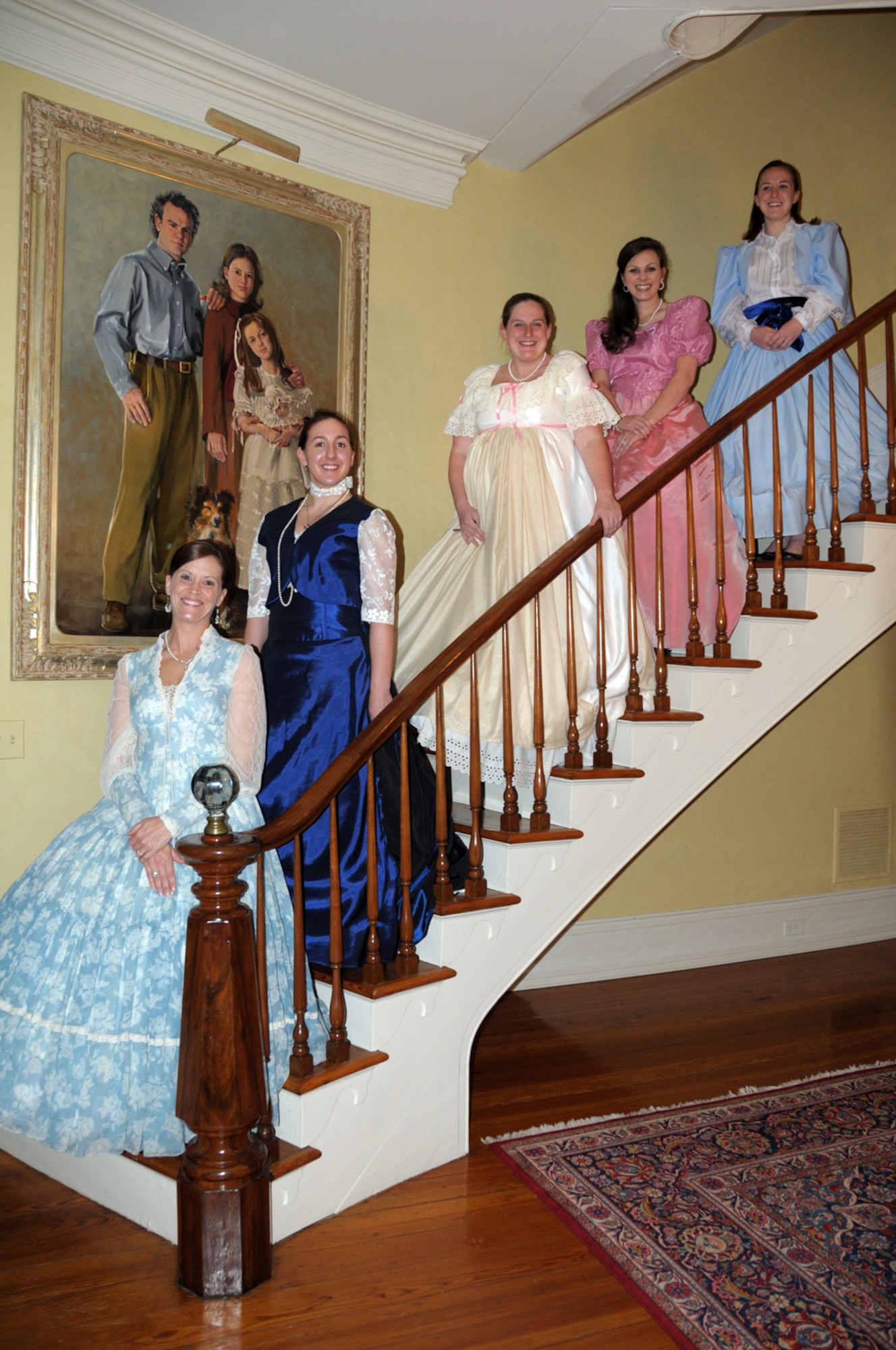 Volunteers at Snowdoun, an antebellum home featured in the Columbus Pilgrimage, stand for a group shot. Volunteers in the photo are: Staff Sgt. Heather Hildrich, Staff Sgt. Amanda Given, Sarah Ayers, Megan Martin-Cook and Emily Jamison. (U.S. Air Force photo/Col. Ken Bryson).