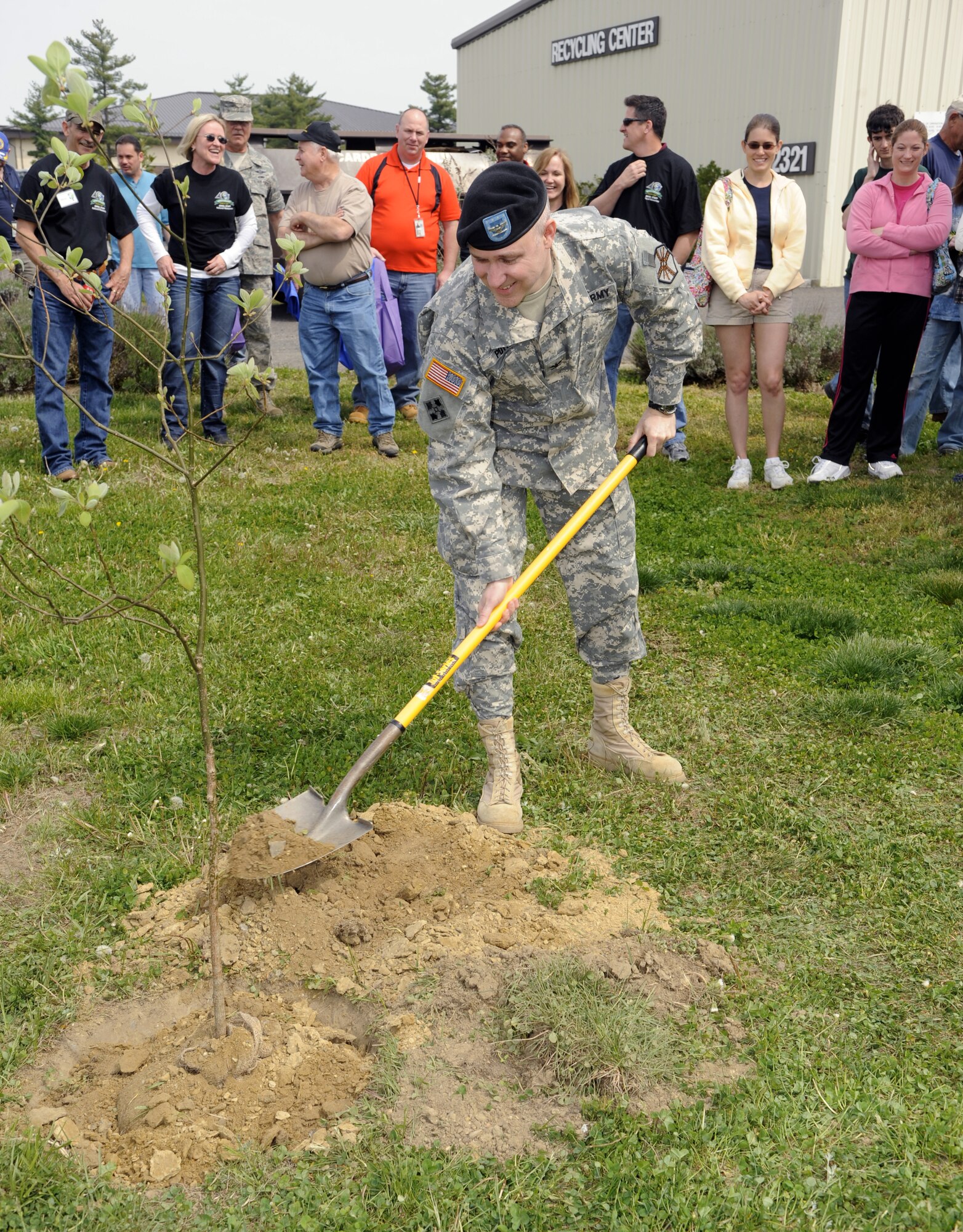 Col. Joseph Poth, 87th Air Base Wing vice commander, helps plant a sassafras tree during an Earth Day event April 21 at the Recycling Center at Joint Base McGuire-Dix-Lakehurst. The Sassafras tree was chosen to represent JB MDL because of its unique feature of having three different kinds of leaves, which will represent the three bases that make up the base. (U.S. Air Force photo/Carlos Cintron)
