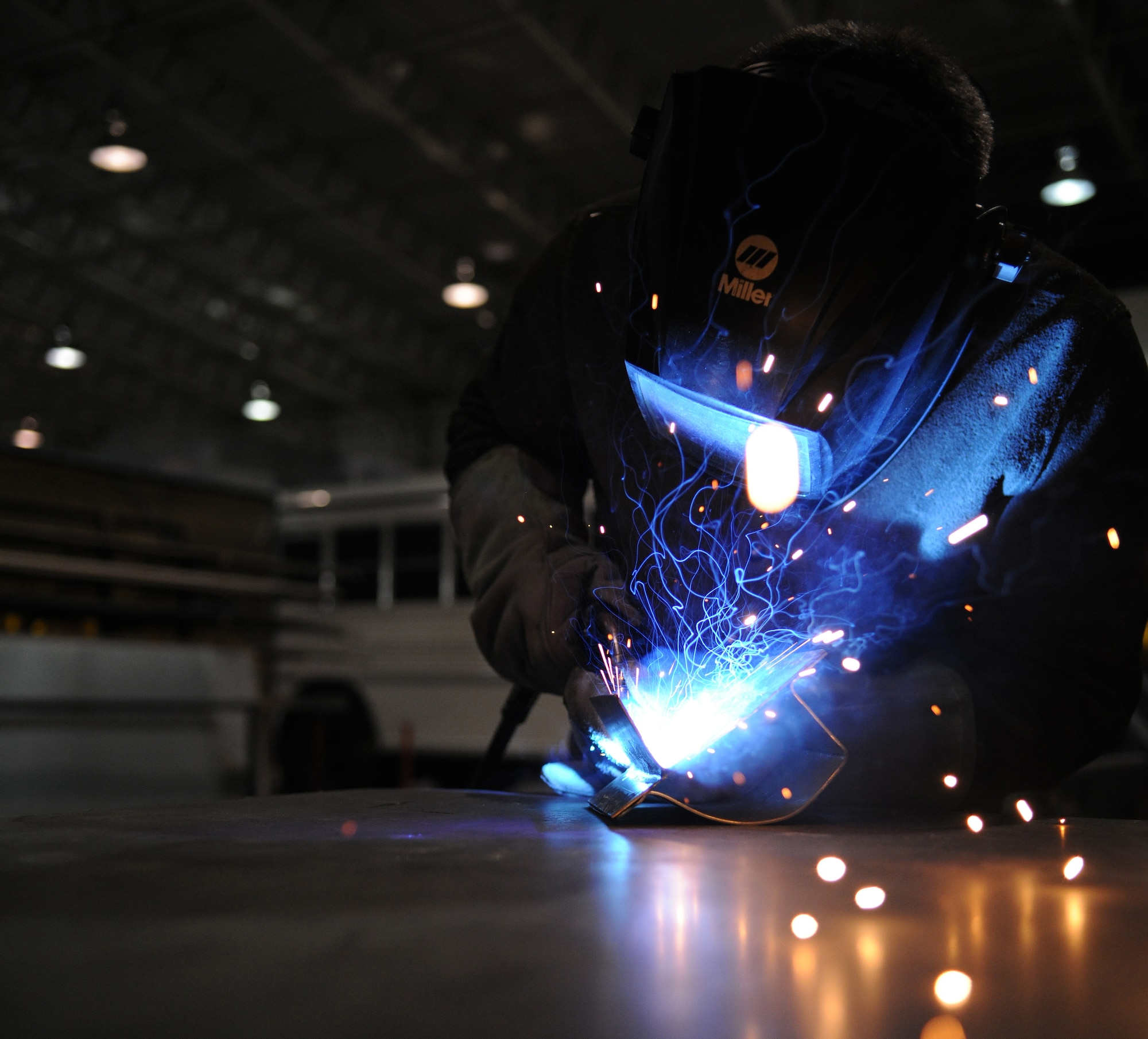 RAF MILDENHALL, England – Senior Airman Joseph Easley, 100th Logistics Readiness Squadron vehicle maintenance technician, fabricates a door pillar to a pick-up truck during training at the vehicle maintenance flight April 21. (U.S. Air Force photo/ Staff Sgt. Jerry Fleshman)