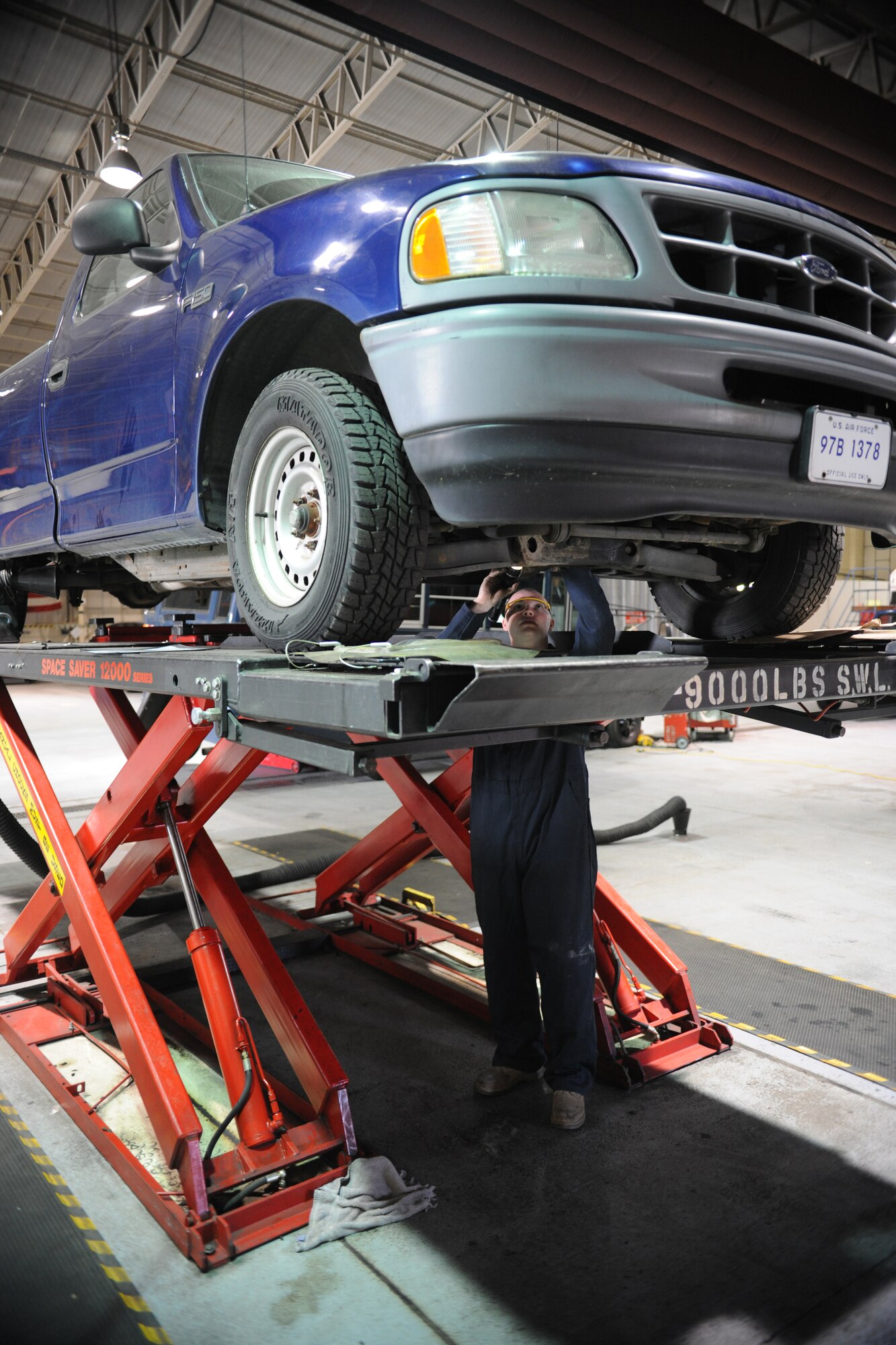RAF MILDENHALL, England – Airman 1st Class Justin Hedlund, 100th Logistics Readiness Squadron vehicle maintenance technician, ensures the integrity of a vehicle underbody during a scheduled vehicle inspection April 21. (U.S. Air Force photo/ Staff Sgt. Jerry Fleshman)