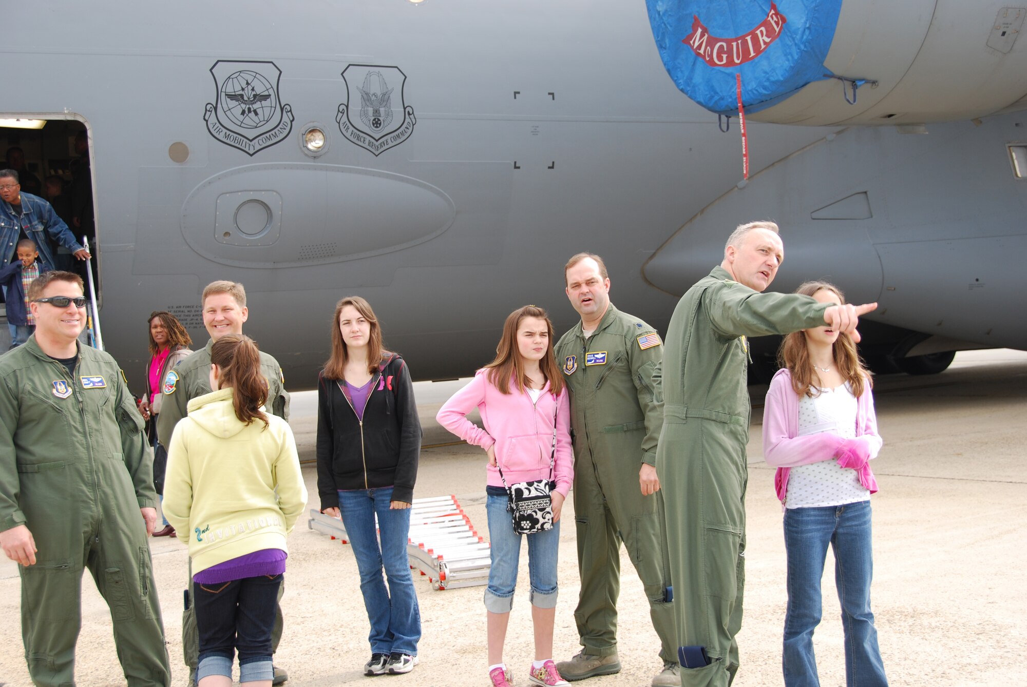 JOINT BASE MCGUIRE-DIX-LAKEHURST, N.J. - Reserve aircrew share time with their children at the C-17 Globemaster III static display; one of several sites more than 60 members visited April 22 during National Bring Your Child to Work Day. (U.S. Air Force photo/Master Sgt. Donna T. Jeffries)