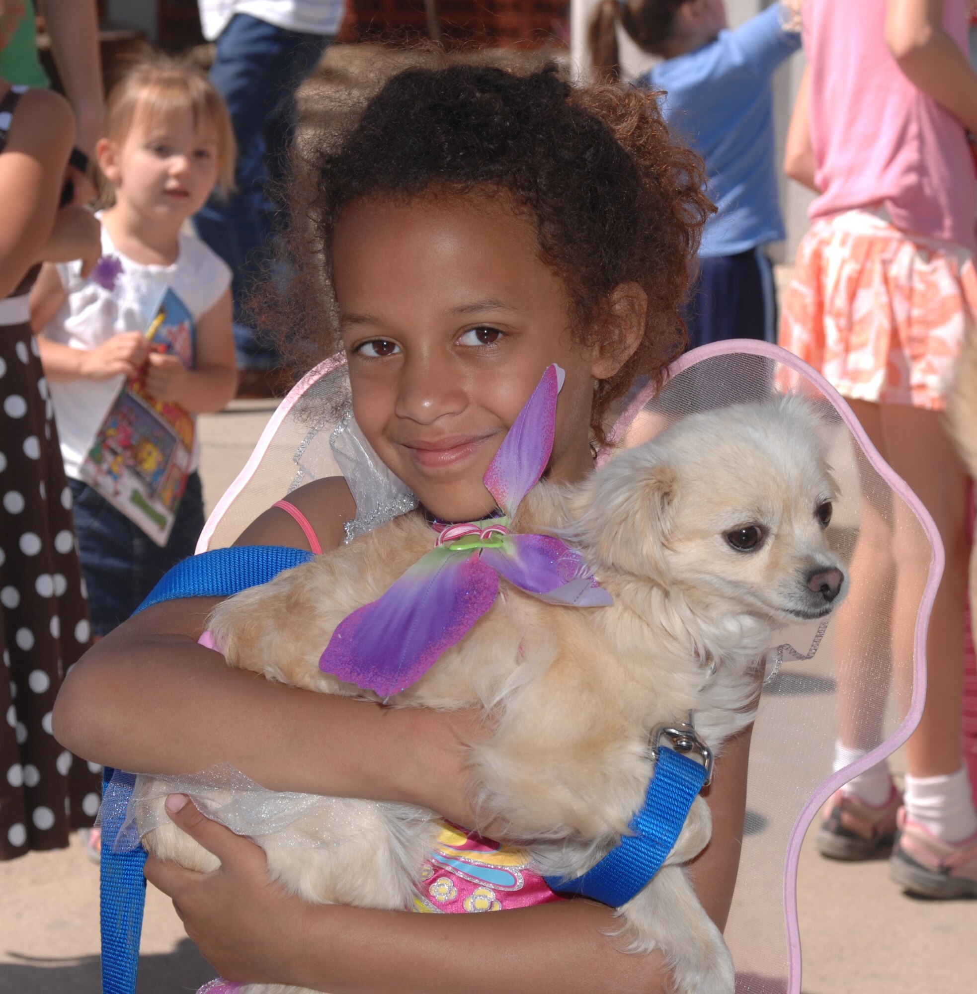 Jayda Hellyer and her Chihuahua, Daisy Dog, take home the prize of “Wackiest Costume” during Pet Daze, a pet appreciation event hosted by the Incirlik Commissary Saturday, April 24, 2010 at Incirlik Air Base, Turkey. The event highlighted the commissary’s new initiative, “Your Pet, Your Family.” About 35-40 pets and their caretakers attended. (U.S. Air Force photo/Tech. Sgt. Valda Wilson)