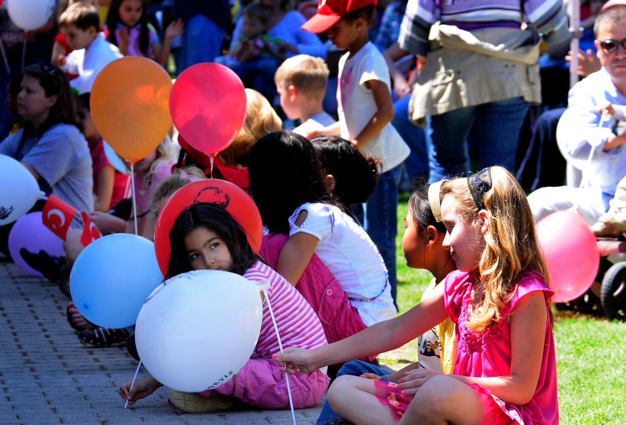 American and Turkish families celebrate National Children’s Day at Arkadas Park Friday, April 23, 2010 at Incirlik Air Base, Turkey. The annual celebration for the children of Turkey included performances showcasing different cultural backgrounds. Mustafa Kemal Ataturk, the founder of modern day Turkey, dedicated April 23 National Children’s Day to demonstrate appreciation for the future of the nation. (U.S. Air Force photo/Senior Airman Alex Montes) 