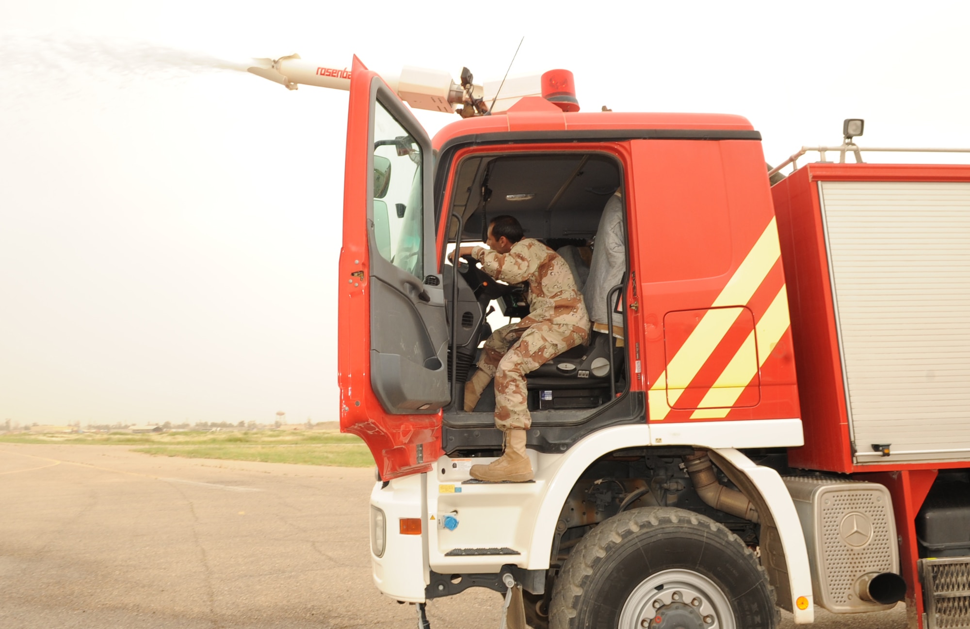 Members from the 506th Air Expeditionary Group and Iraq Training and Advisory Mission facilitated a maintenance education day between the Province of Kirkuk Fire Department (PKFD) and the Iraq Air Force Fire Department (IqAF/FD) at Kirkuk Regional Air Base, Iraq.  The PKFD members shared their knowledge of how to repair the European-type fire equipment with the IqAF vehicle maintainers.  (U.S. Air Force photo/Staff Sgt. Tabitha Kuykendall/Released)	 