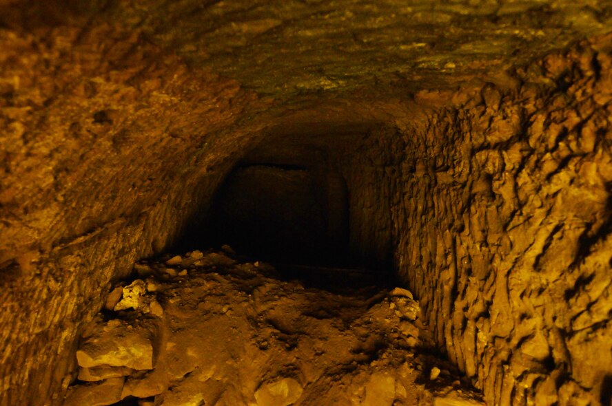 When Americans first entered the Naval Underground Headquarters after fighting ended there, many of the tunnels looked like the one displayed. Most of the outside entrances to the tunnels had collapsed, or had been blown shut, during the fighting. (U.S. Air Force photo/Staff Sgt. Christopher Hummel)
