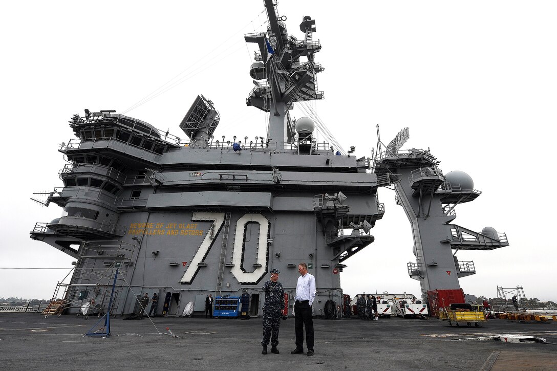 Deputy Defense Secretary William J. Lynn III tours the flight deck aboard the USS Carl Vinson while visiting Naval Air Station North Island, Calif., April 26, 2010.