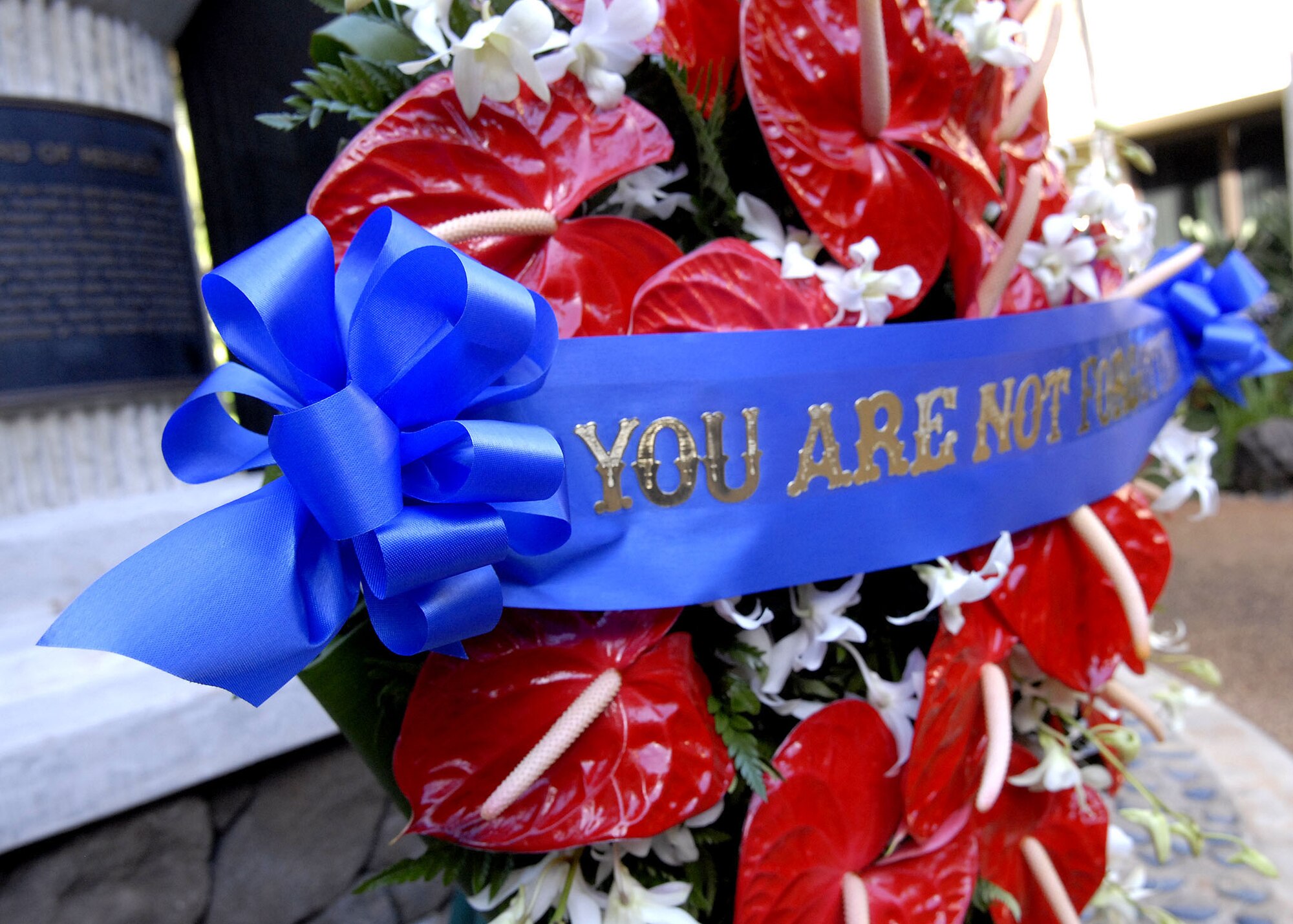 A special wreath, which reads you are gone but not forgotten, laid at the Courtyard of Heroes, Headquarters Pacific Air Forces, Joint Base Pearl Harbor Hickam, Hawaii, April 26, 2010, to honor the brave Airmen who died at Hickam Air Field, Dec. 7, 1941 (U.S. Air Force photo/Tech. Sgt. Jerome S. Tayborn)