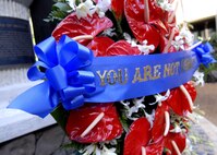 A special wreath, which reads you are gone but not forgotten, laid at the Courtyard of Heroes, Headquarters Pacific Air Forces, Joint Base Pearl Harbor Hickam, Hawaii, April 26, 2010, to honor the brave Airmen who died at Hickam Air Field, Dec. 7, 1941 (U.S. Air Force photo/Tech. Sgt. Jerome S. Tayborn)